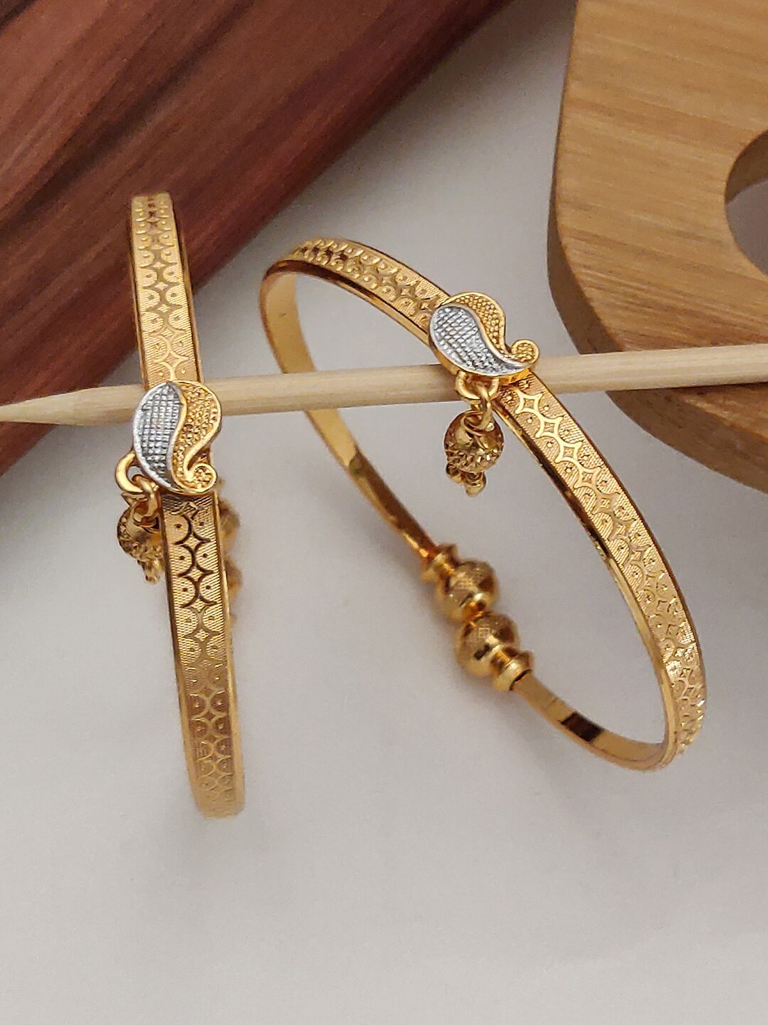 

Shining Diva Set of 2 Gold Plated Crystal Studded Bangles