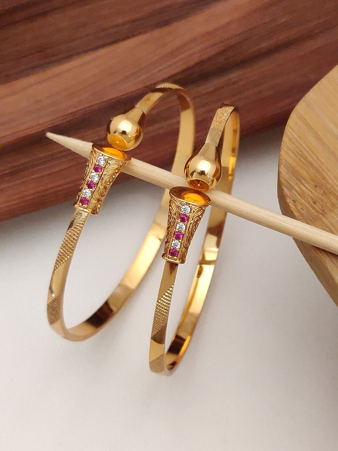 

Shining Diva Set of 2 Gold Plated Crystal Studded Bangles