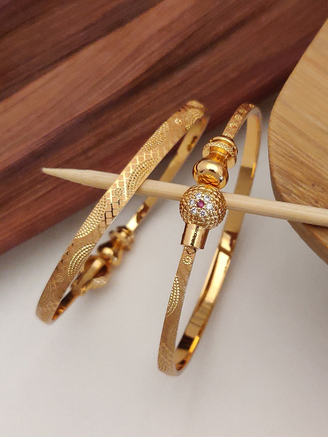 

Shining Diva Set of 2 Gold Plated Crystal Studded Bangles