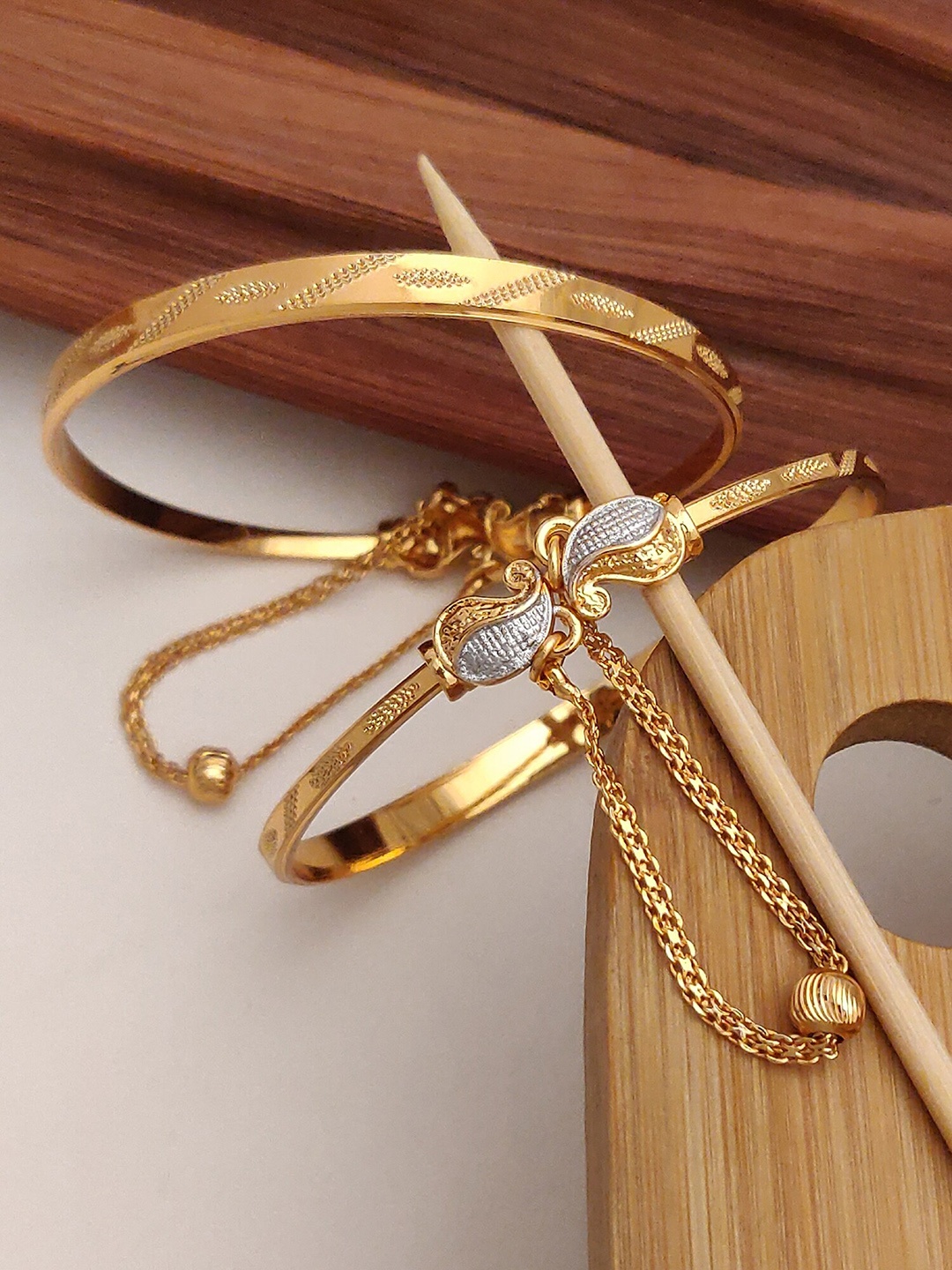 

Shining Diva Set Of 2 Gold Plated & Crystal Studded Bangles