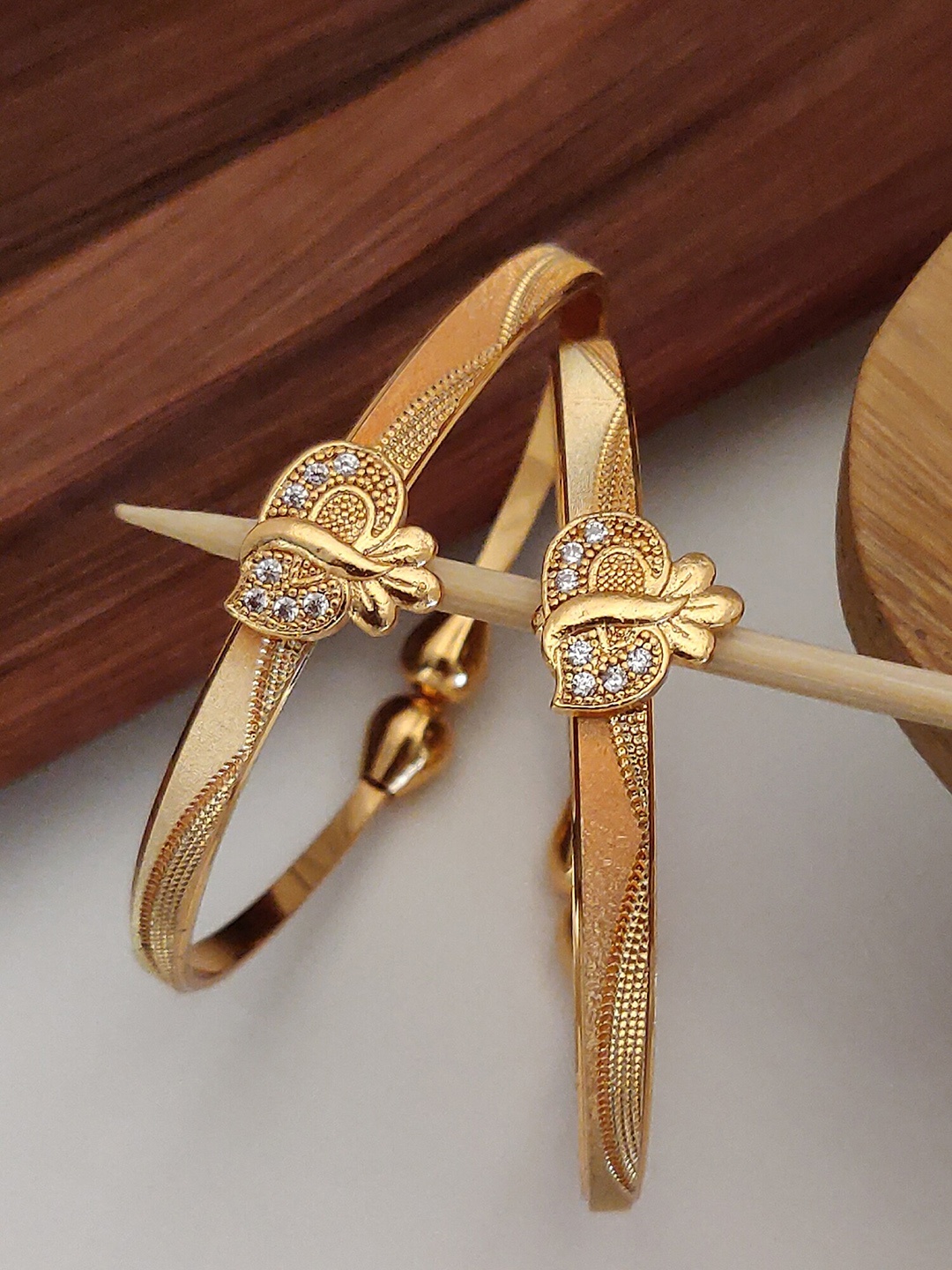 

Shining Diva Set of 2 Gold Plated Crystal Studded Bangles