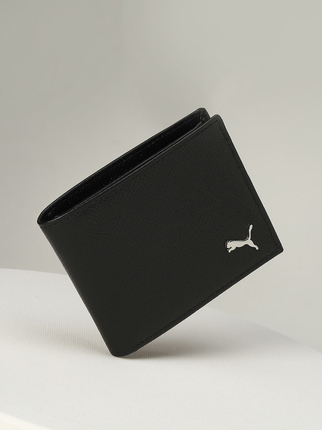 

Puma Textured Leather Plain Wallets, Black