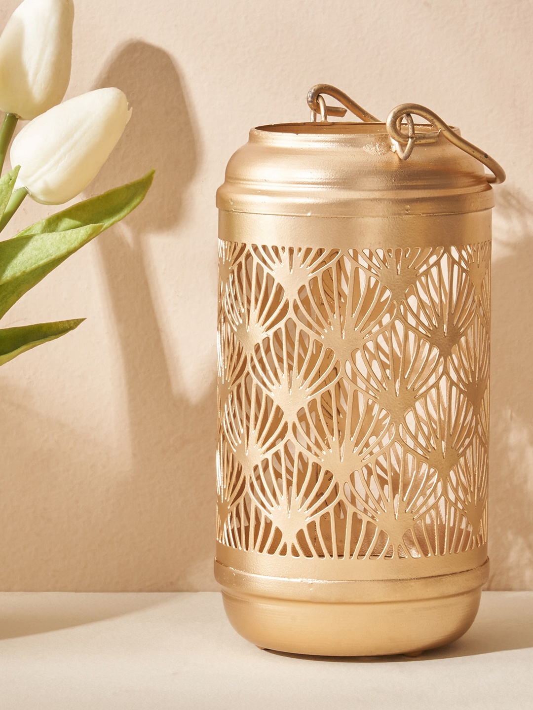 

Home Centre Aerin Gold Toned Textured Candle Holder