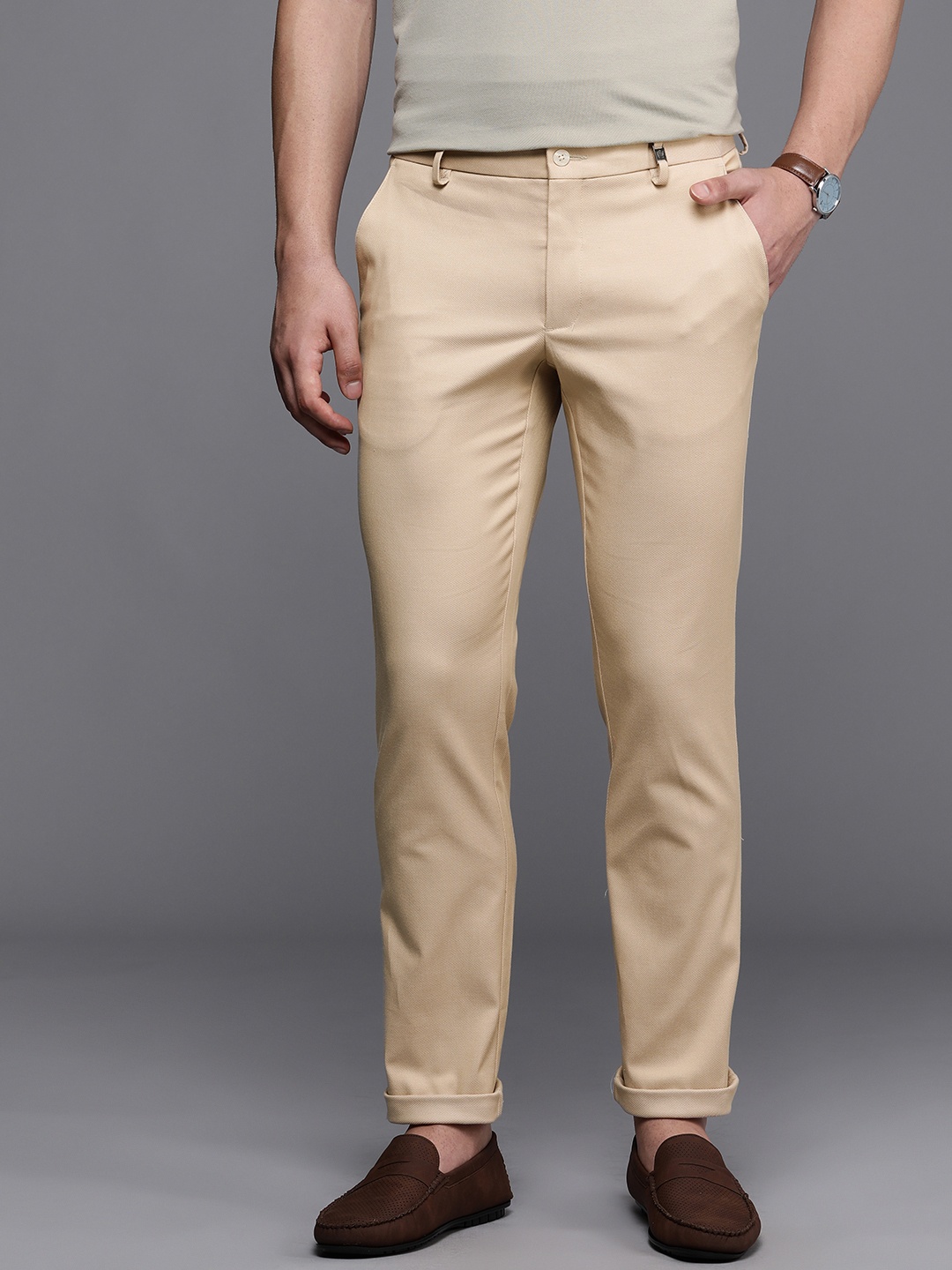 

Louis Philippe Sport Men Textured Tapered Fit Low-Rise Chinos Trousers, Beige