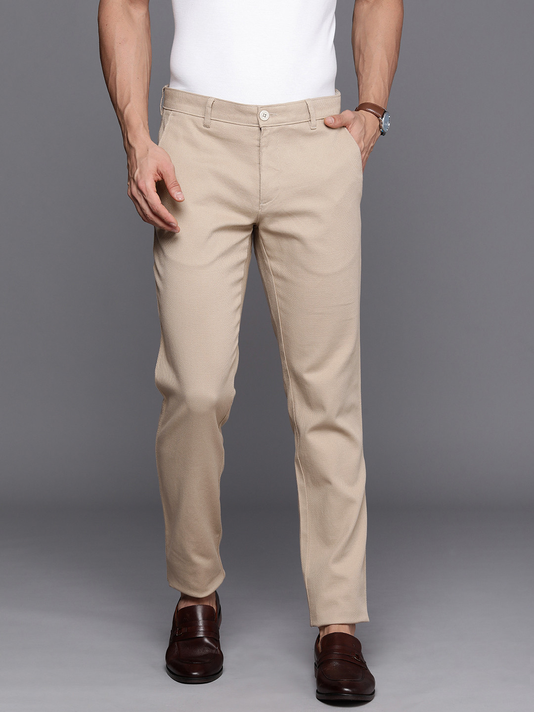 

Louis Philippe Sport Men Textured Self Design Slim Fit Low-Rise Woven Regular Trousers, Beige