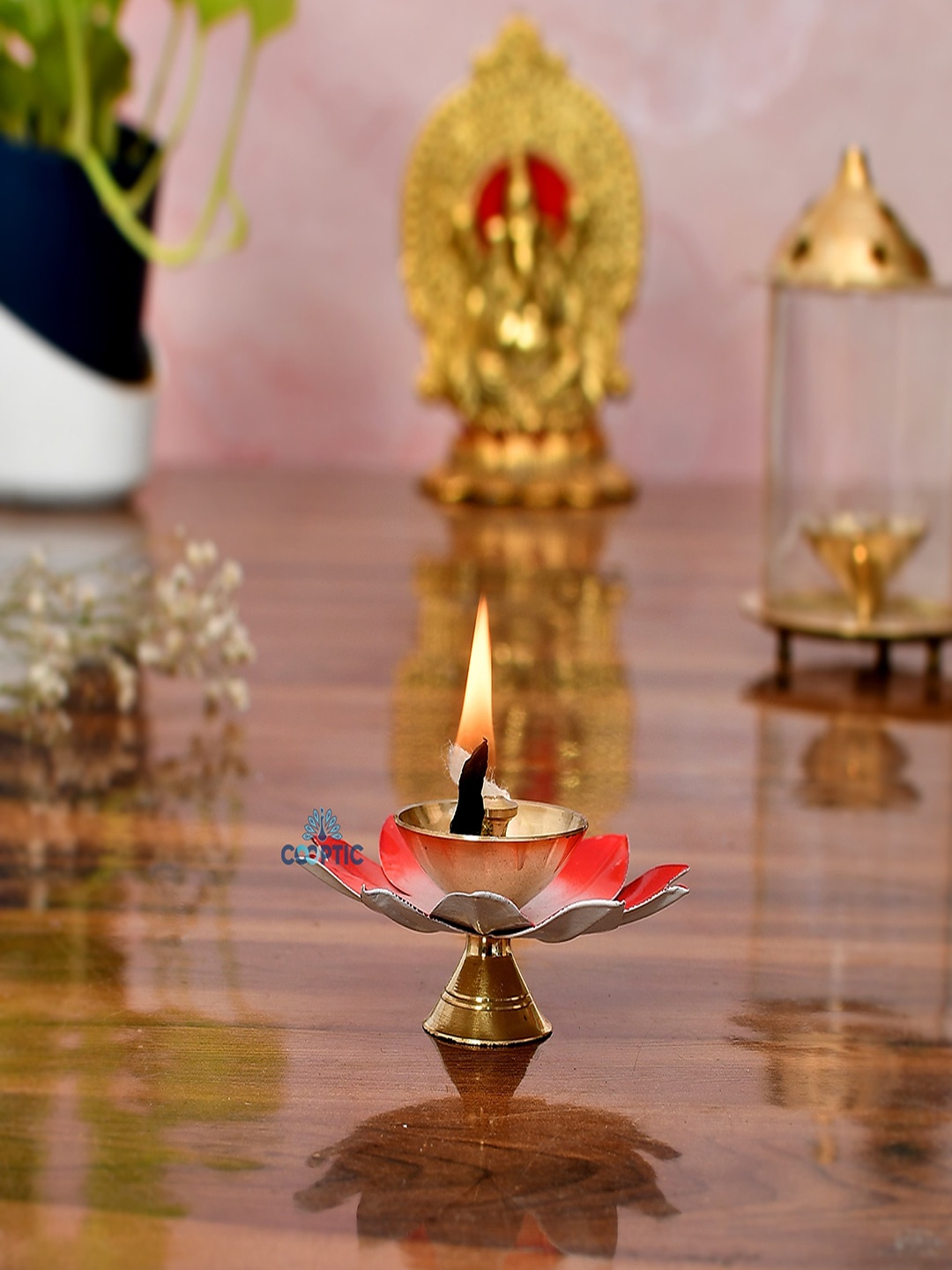 

COOPTIC Red & Gold Toned Textured Lotus Shape Metal Diya