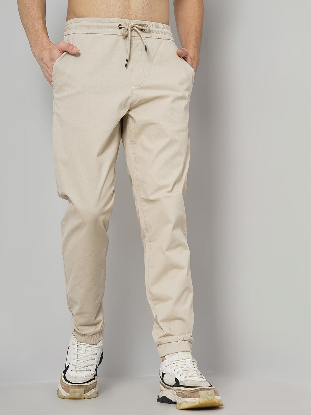 

Celio Men Cotton Mid Rise Joggers, Beige