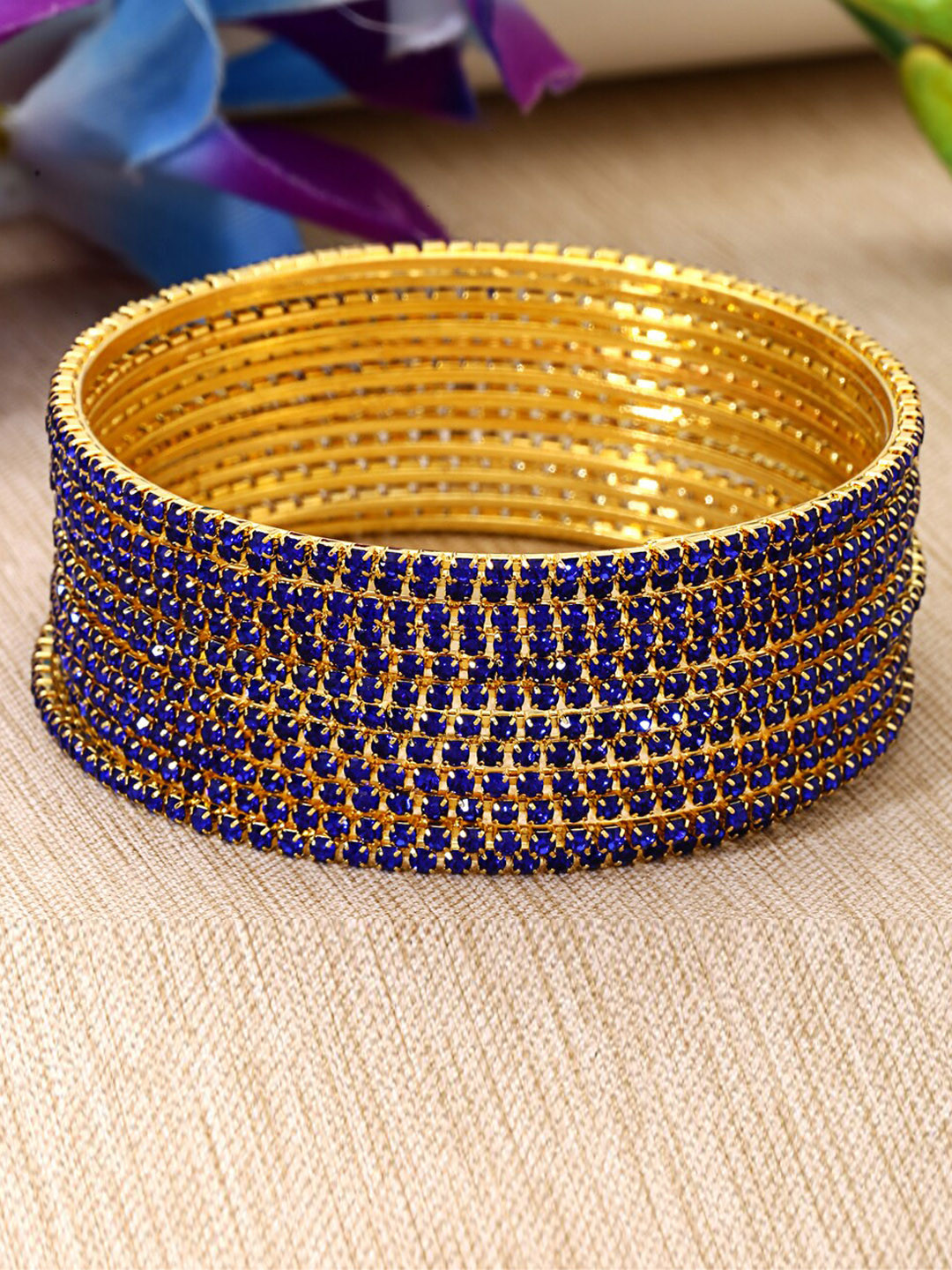 

Shining Diva Set Of 12 Gold Plated Crystal Studded Bangles