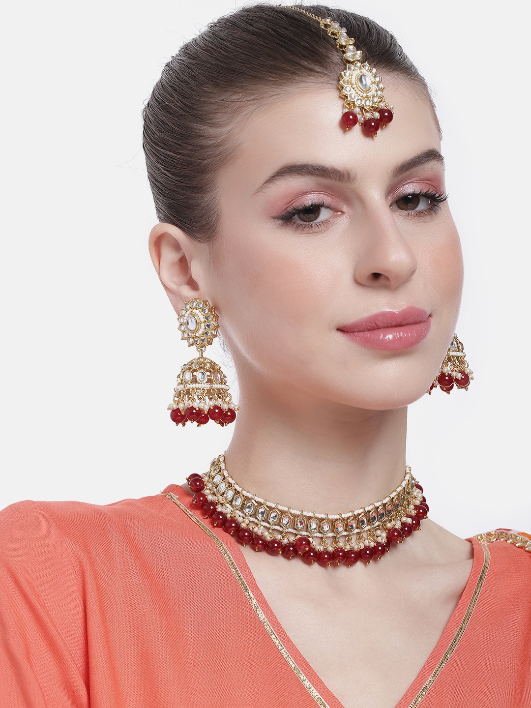 

Peora Women Gold-Plated Kundan Studded Choker Necklace with Earrings & Maangtikka, Maroon