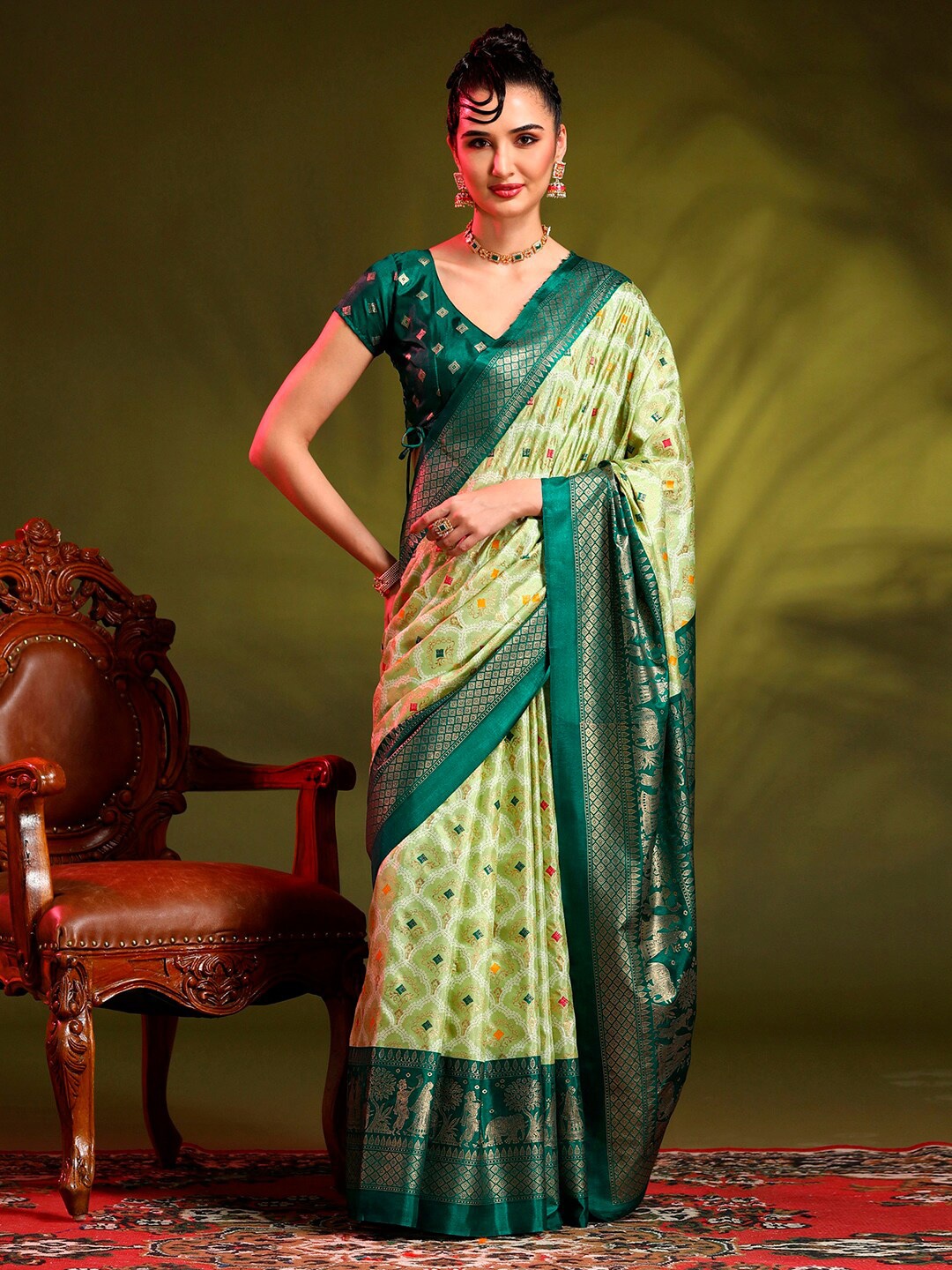 

Anouk Green Ethnic Motifs Printed Zari Saree