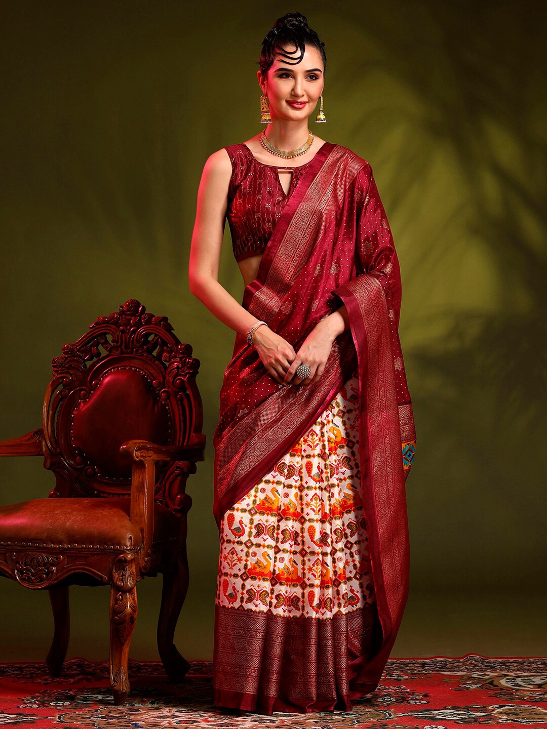 

Anouk Burgundy & Off White Ethnic Motifs Printed Half And Half Patola Saree