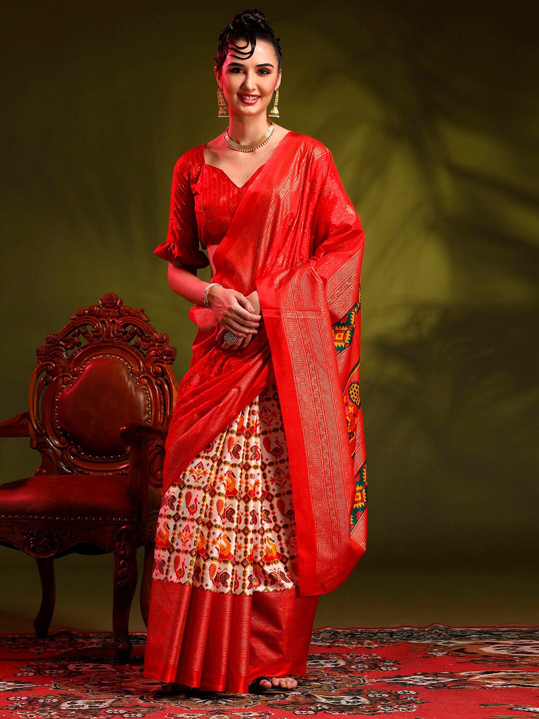 

Anouk Rustic Red & Off White Ethnic Motifs Printed Half and Half Patola Saree