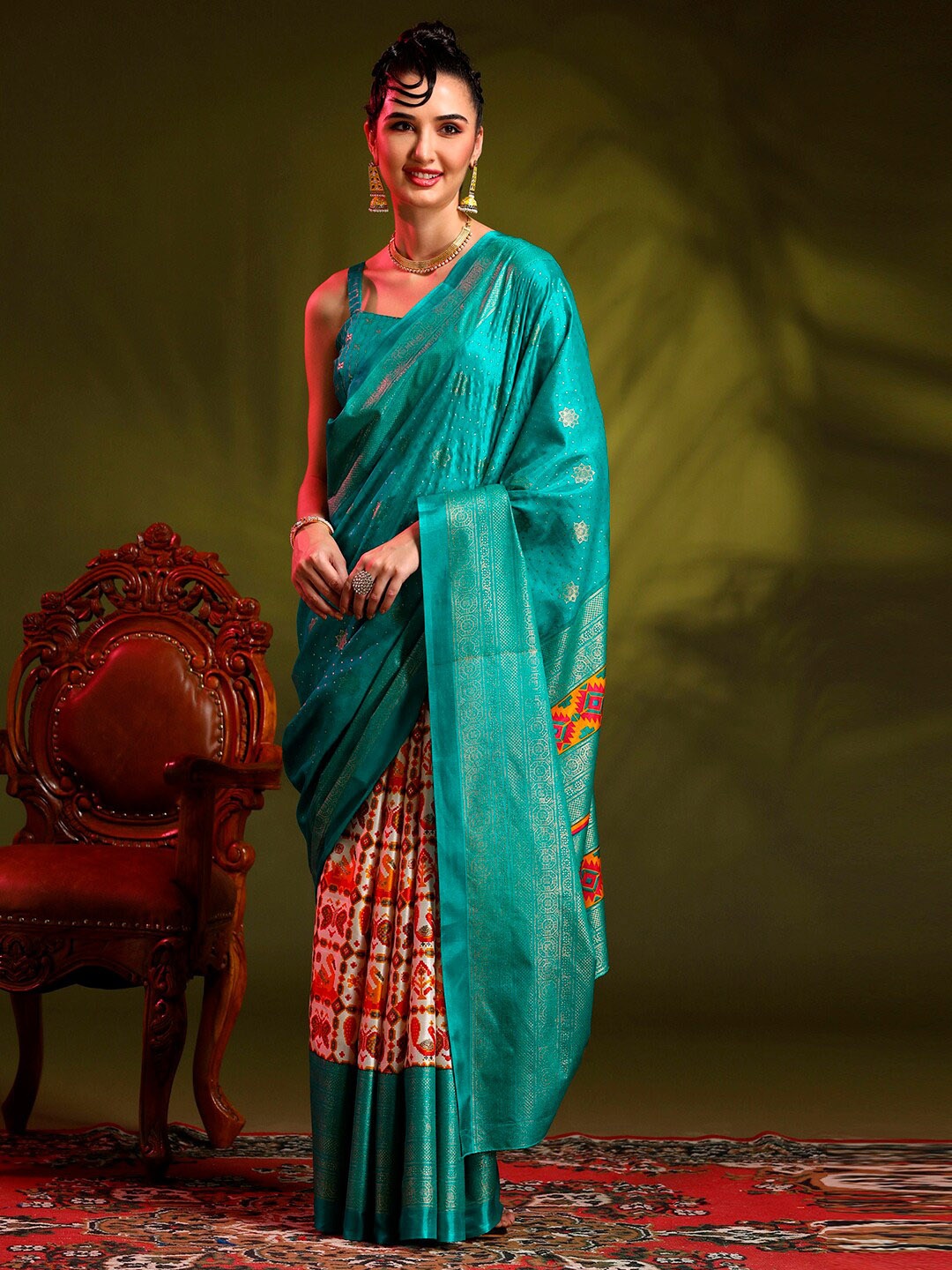 

Anouk Blue & Off White Ethnic Motifs Printed Half and Half Patola Saree