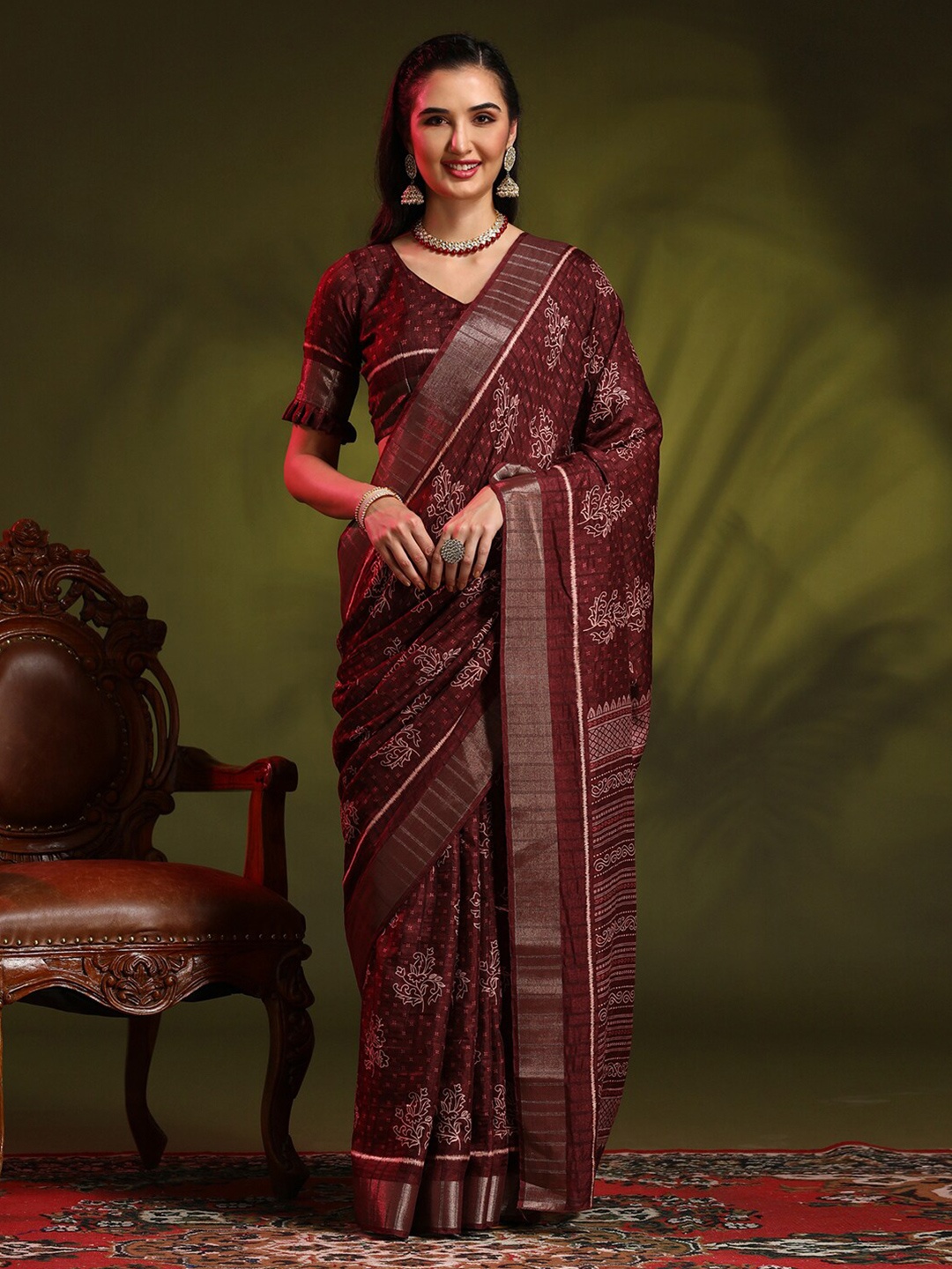 

Anouk Rustic Burgundy Ethnic Motifs Printed Zari Sungudi Saree