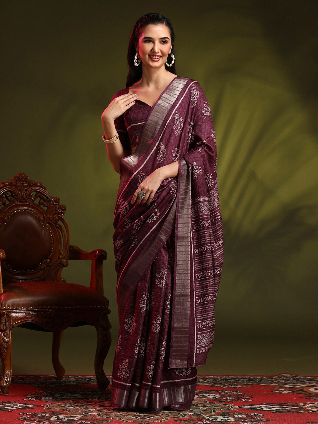 

Anouk Purple Ethnic Motifs Printed Zari Detailed Saree