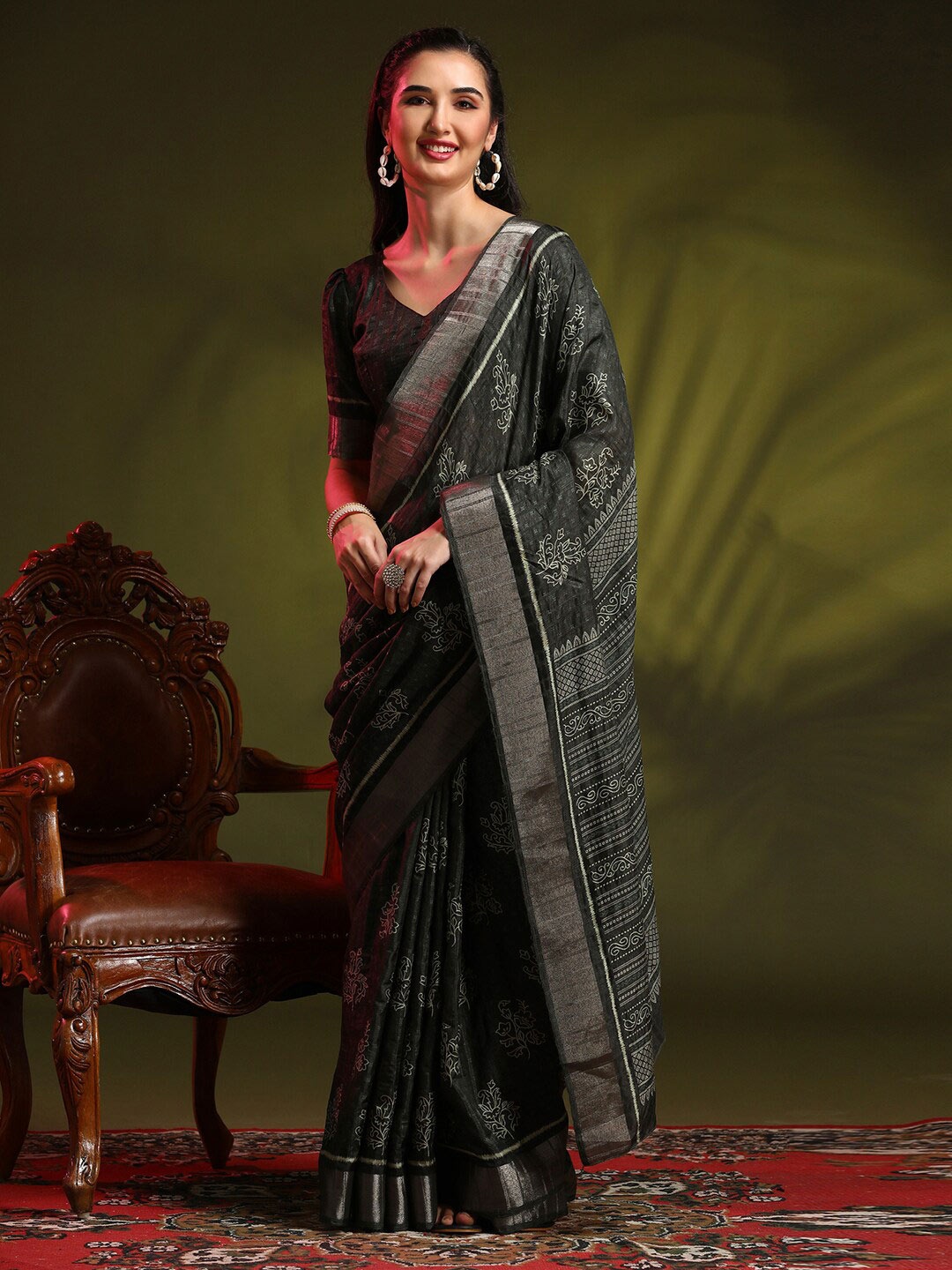 

Anouk Rustic Black Ethnic Motifs Printed Zari Sungudi Saree