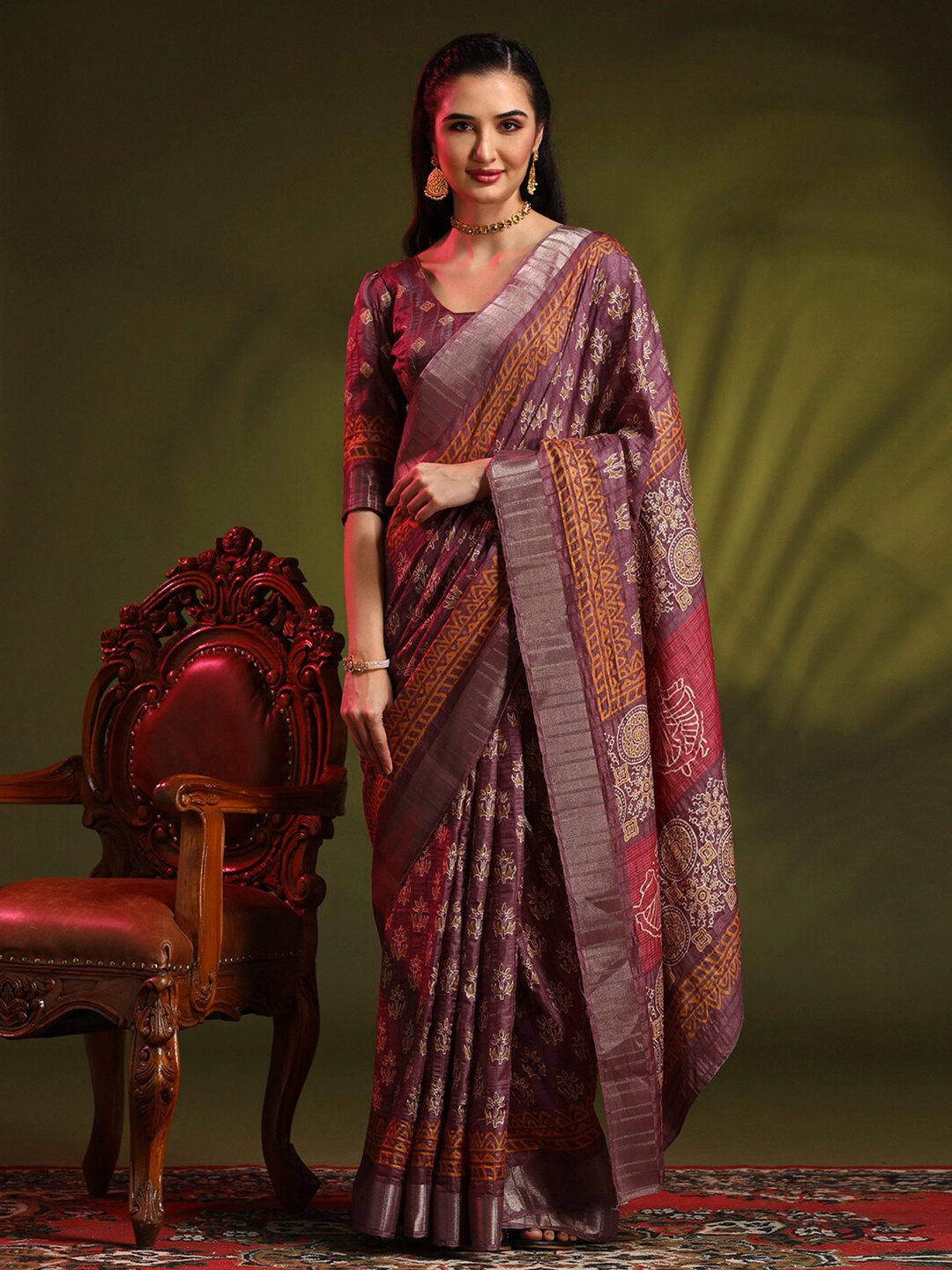 

Anouk Mauve Ethnic Motifs Printed Zari Detailed Saree