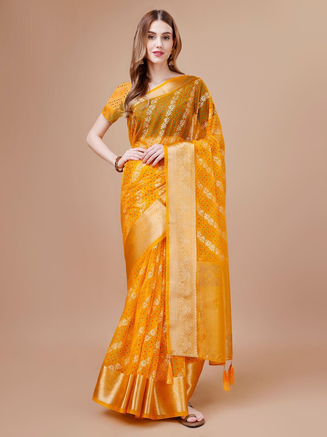 

Mitera Yellow Ethnic Motifs Woven Design Zari Organza Saree