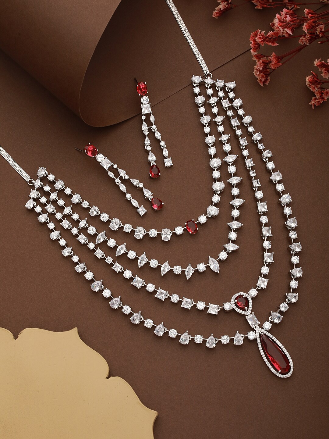 

Saraf RS Jewellery Silver Plated American Diamond Studded Necklace & Earrings