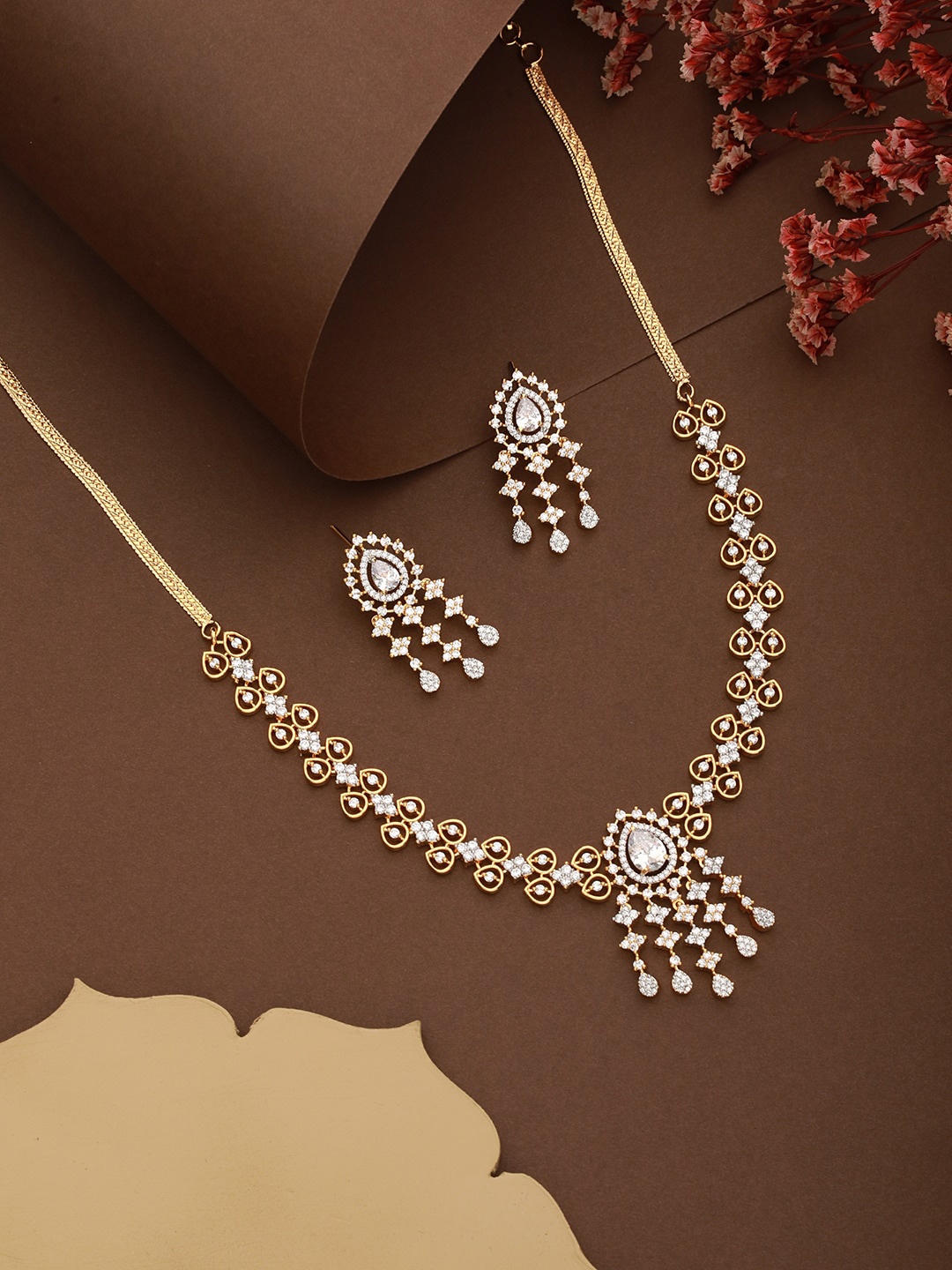 

Saraf RS Jewellery AD Studded Minimal Floral Necklace with Earrings, Gold