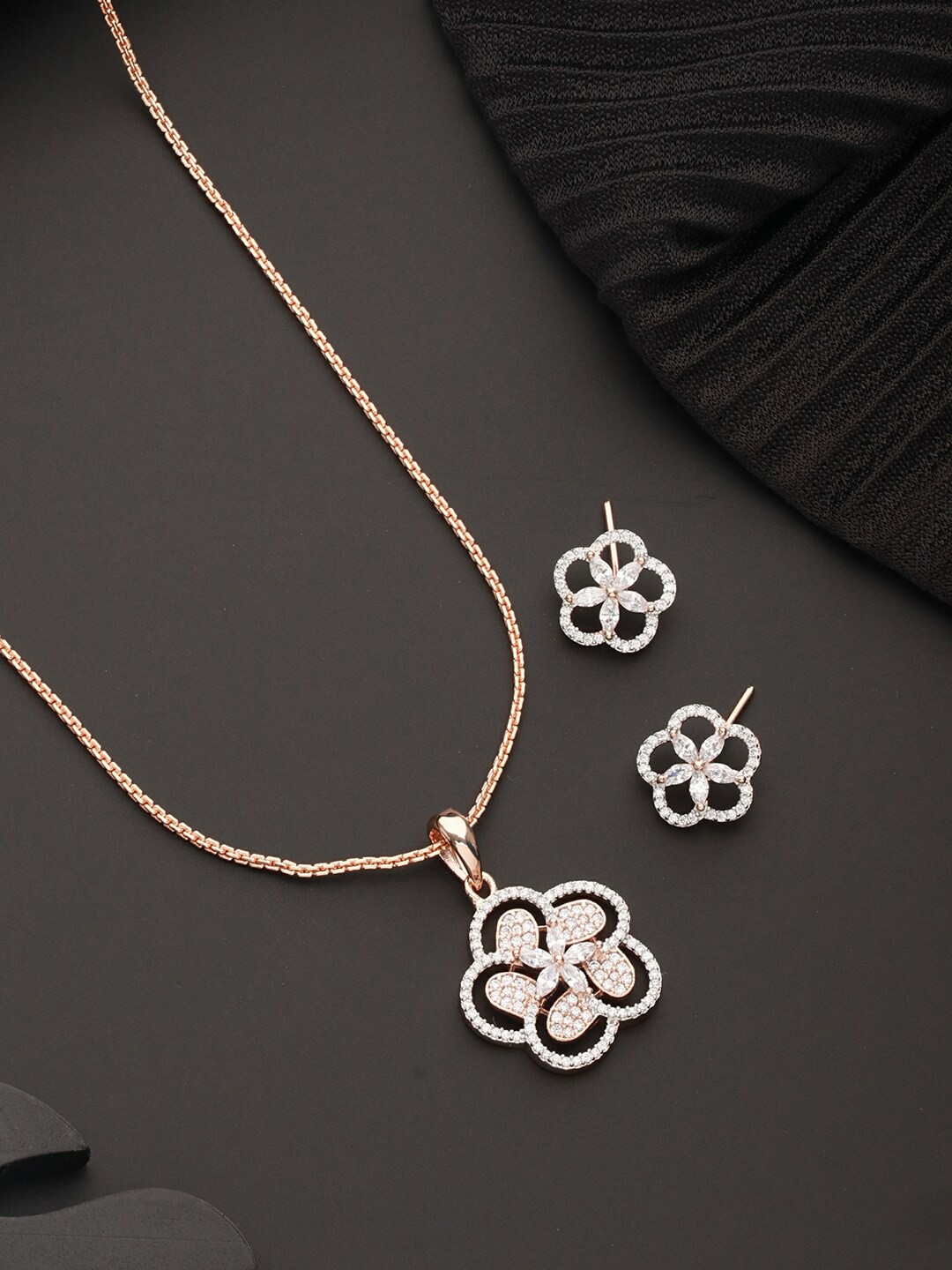 

Saraf RS Jewellery Rose Gold Plated AD Studded Minimal Floral Necklace with Earrings