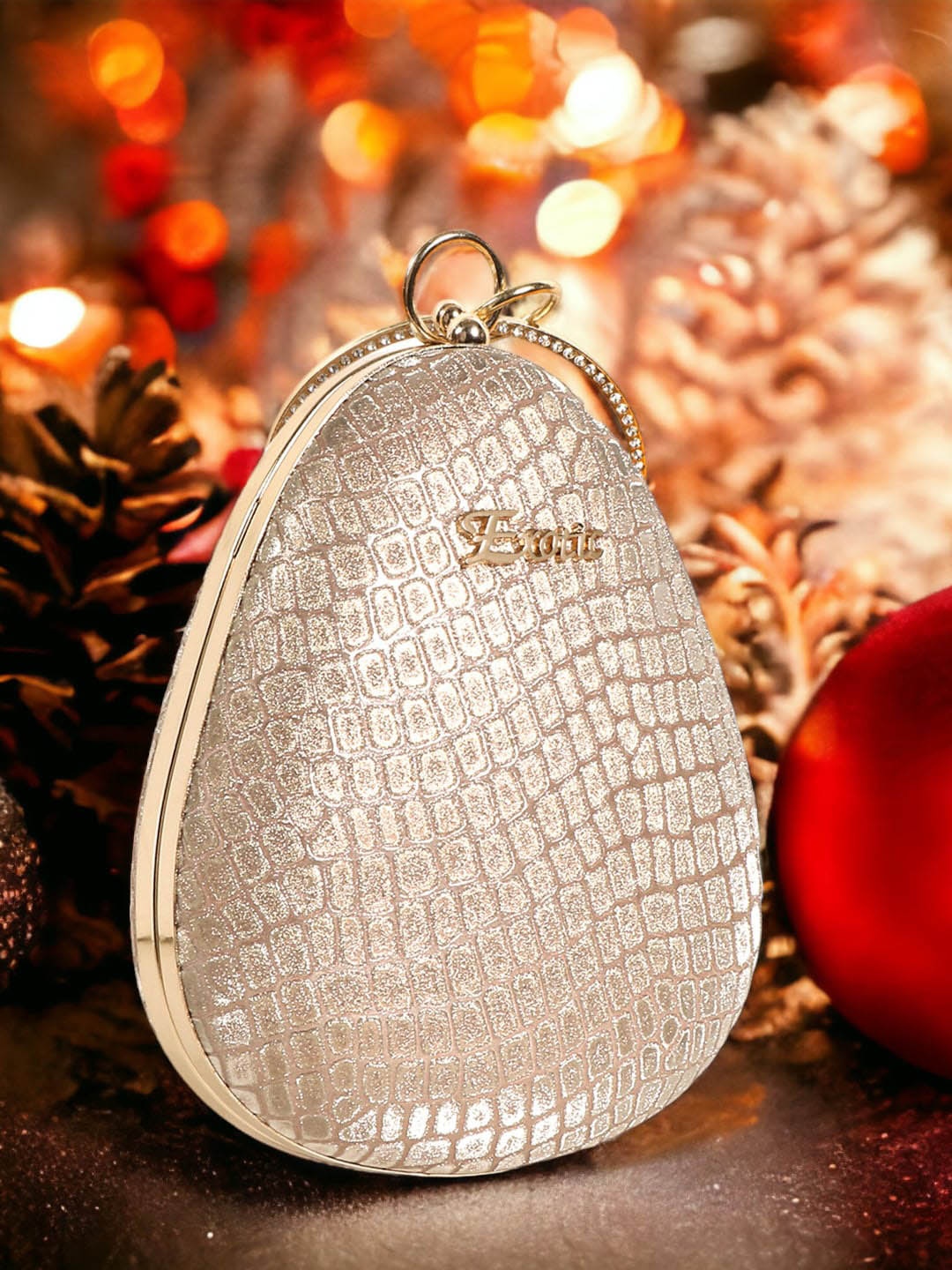 

Exotic Embellished Oval Clutches, Gold