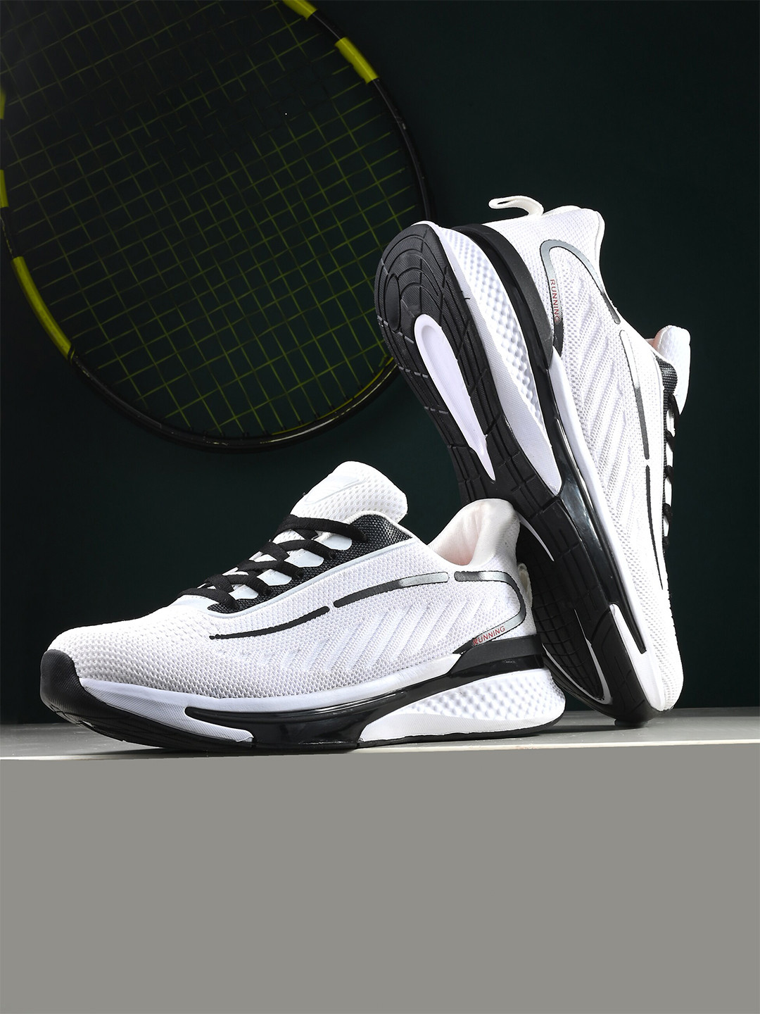 

The Roadster Lifestyle Co. Men White & Black Mesh Lightweight Anti Skid Running Shoes