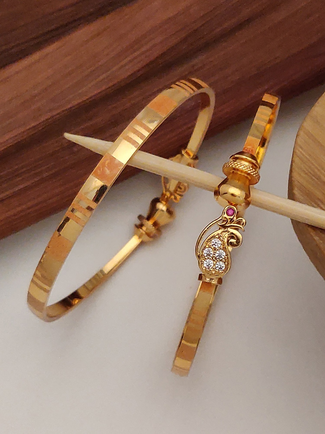 

Shining Diva Set Of 2 Gold-Plated Crystal-Studded Bangles