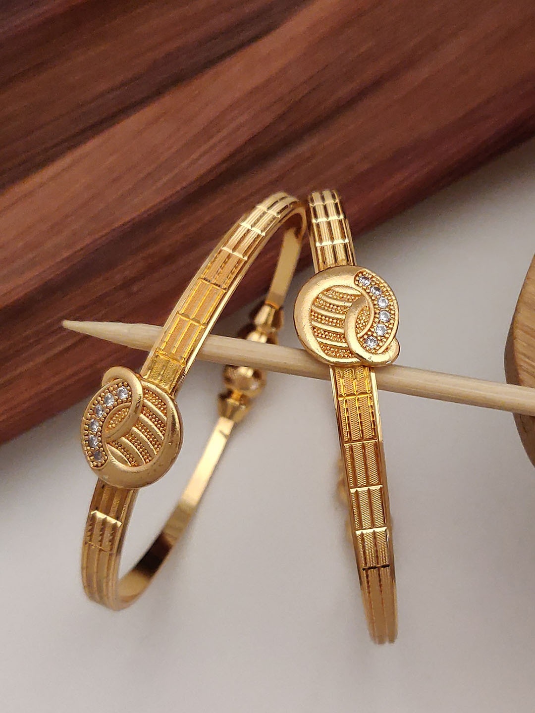 

Shining Diva Set of 2 Gold Plated Crystal Studded Bangles