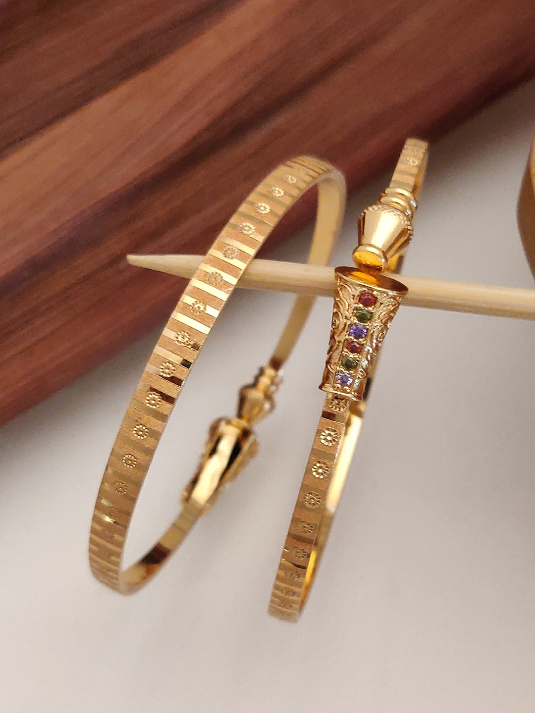 

Shining Diva Set Of 2 Gold-Plated Crystal-Studded Bangles