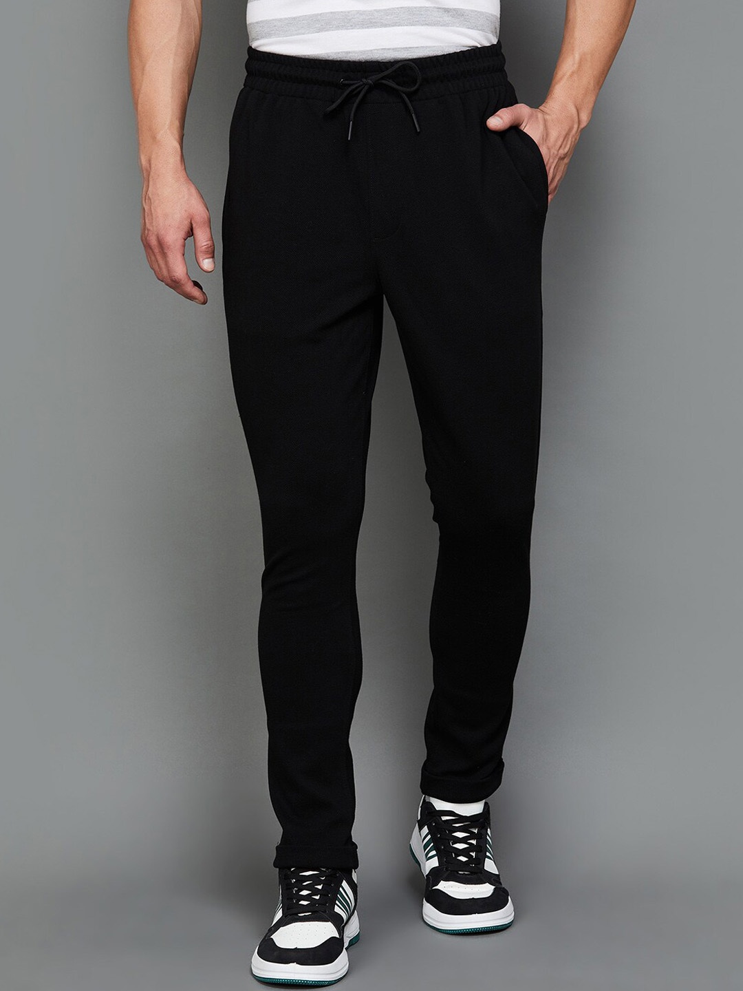 

Fame Forever by Lifestyle Men Mid-Rise Regular Fit Track Pant, Black
