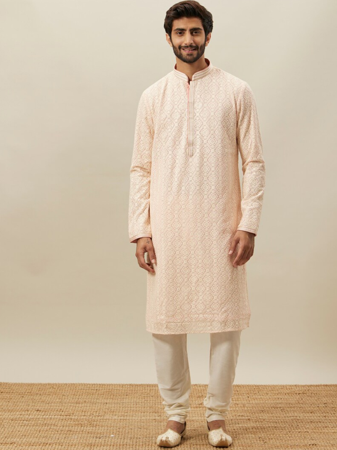 

Twamev Ethnic Motifs Embroidered Mandarin Collar Regular Thread Work Kurta with Churidar, Pink