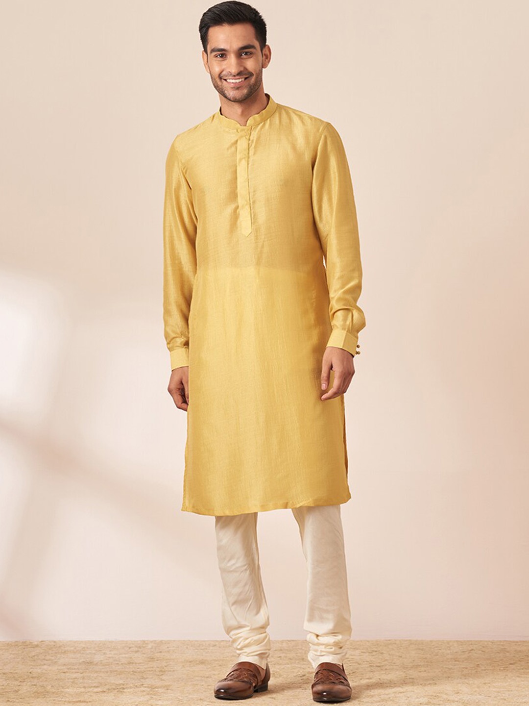 

Twamev Mandarin Collar Straight Kurta with Churidar & Nehru Jacket, Yellow