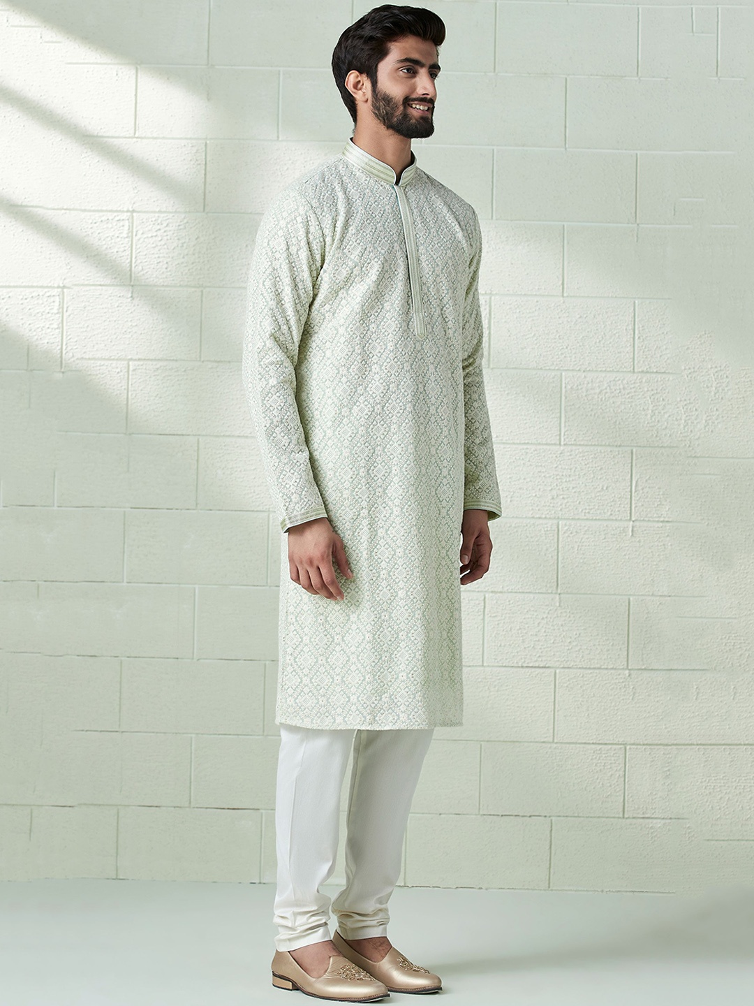 

Twamev Embroidered Ethnic Motifs Regular Kurta With Churidar, Green