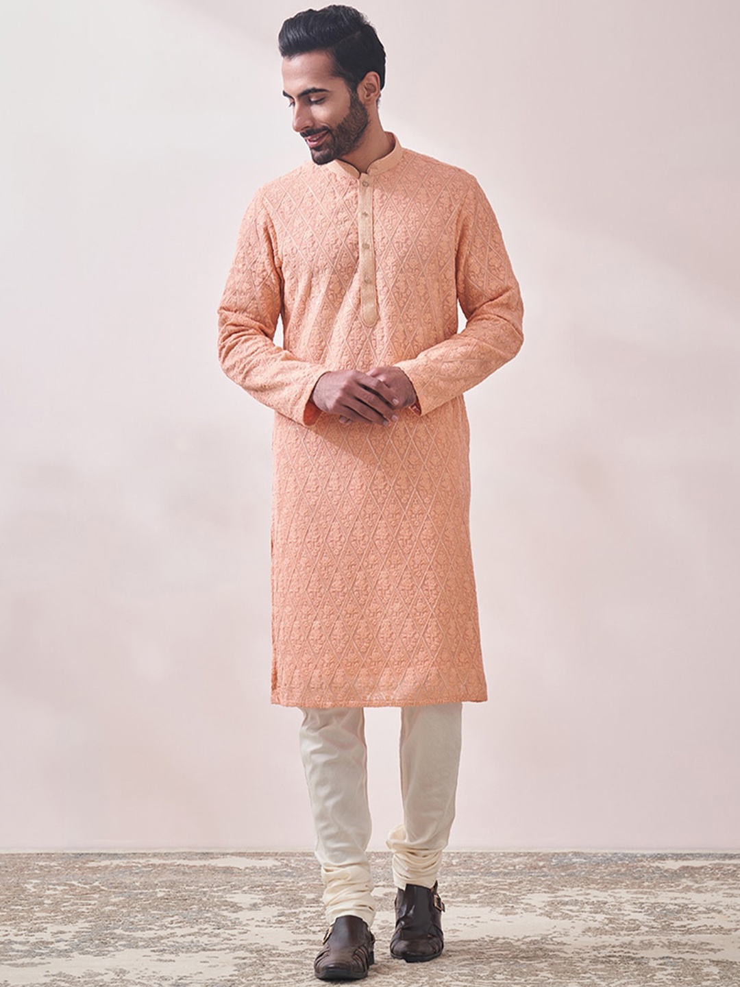 

Twamev Ethnic Motifs Embroidered Kurta With Churidar, Orange