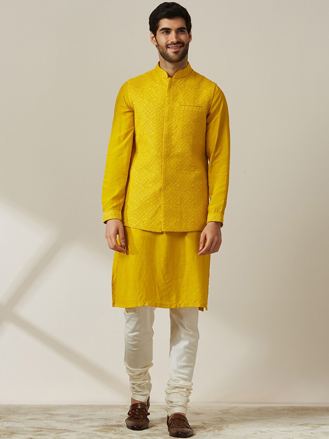 

Twamev Floral Embroidered Regular Art Silk Kurta & Churidar With Nehru Jacket, Mustard