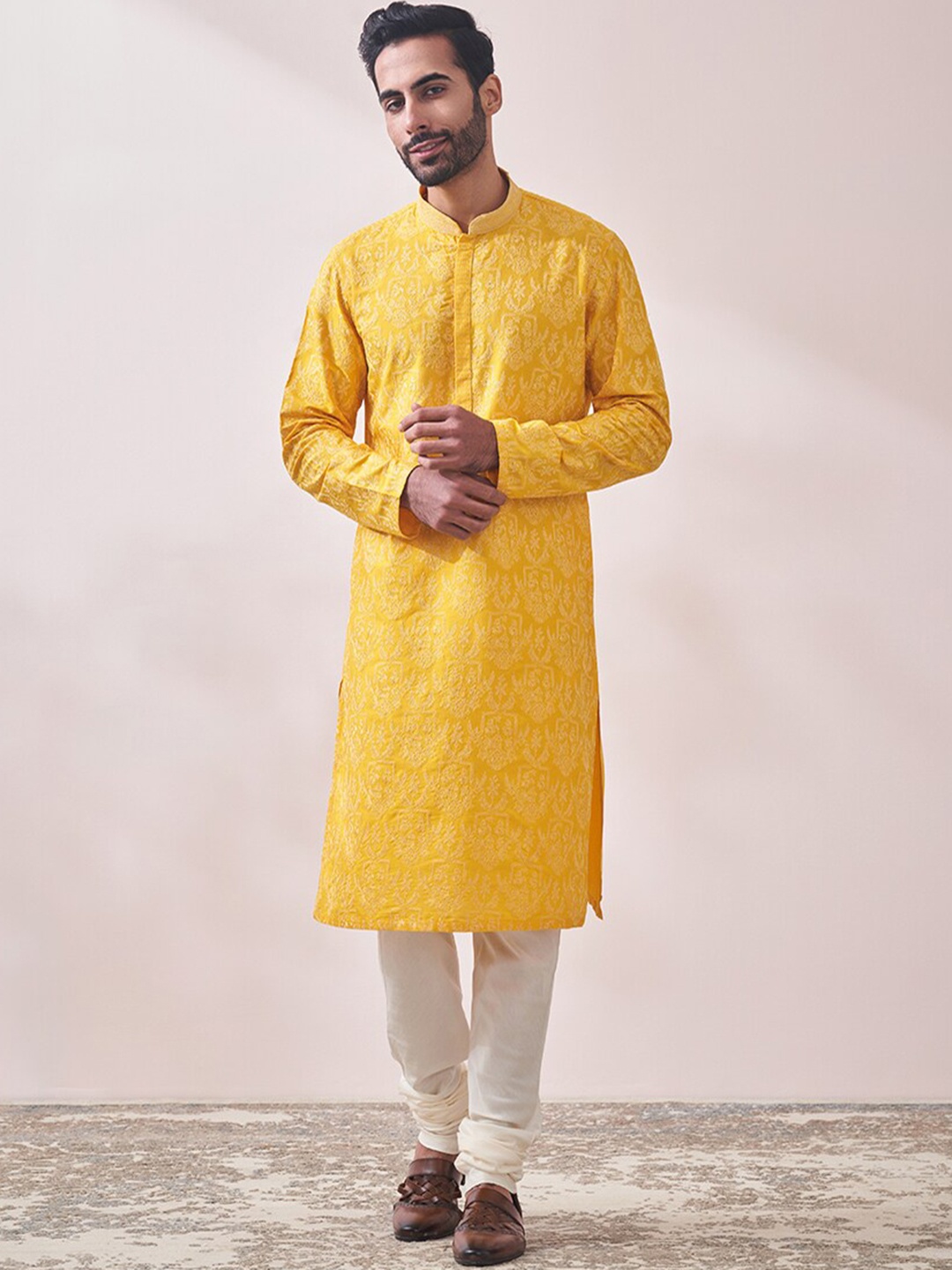 

Twamev Ethnic Motifs Embroidered Mandarin Collar Kurta with Churidar, Mustard