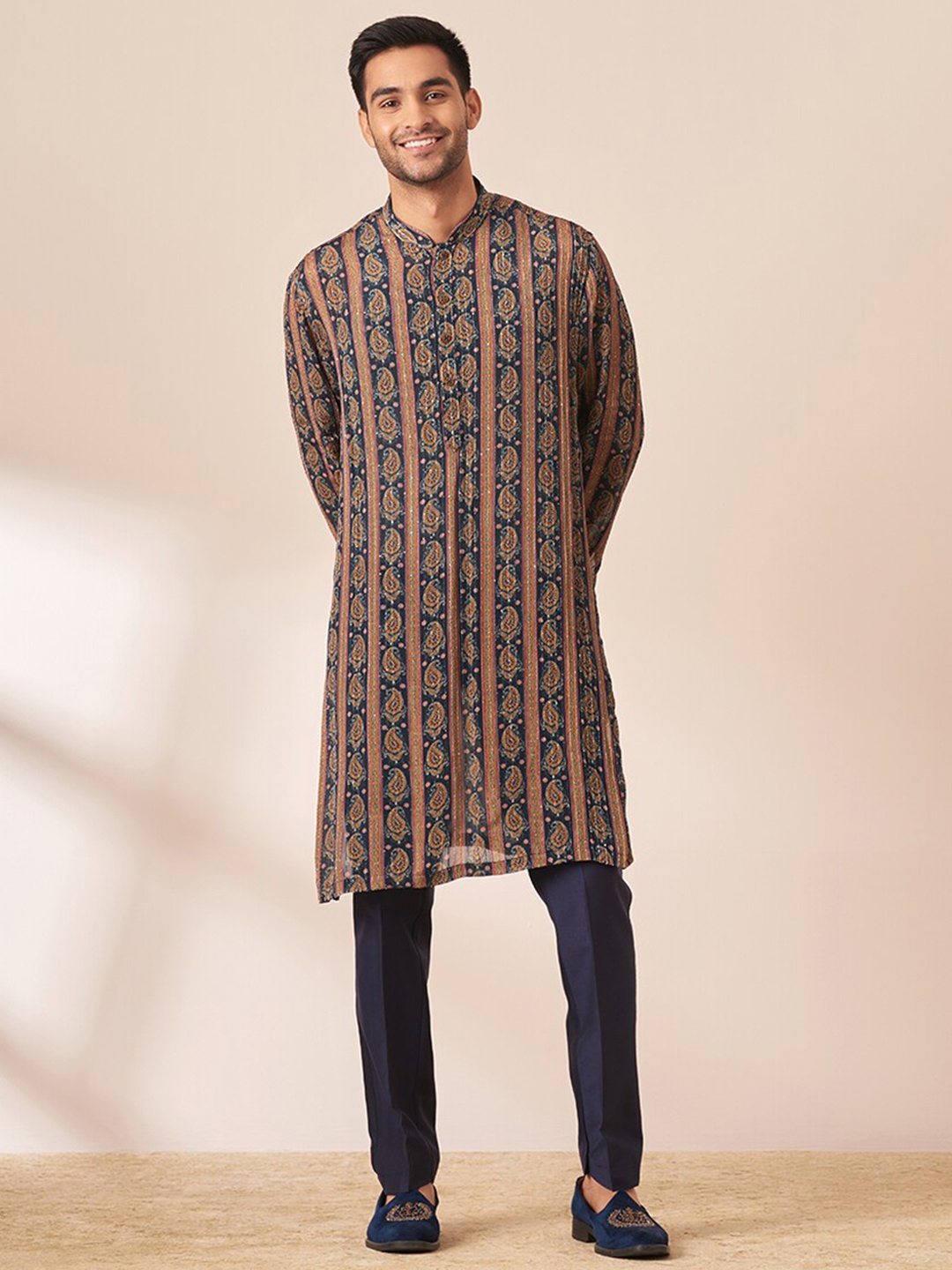 

Twamev Ethnic Motifs Printed Straight Kurta with Trousers & Nehru Jacket, Blue