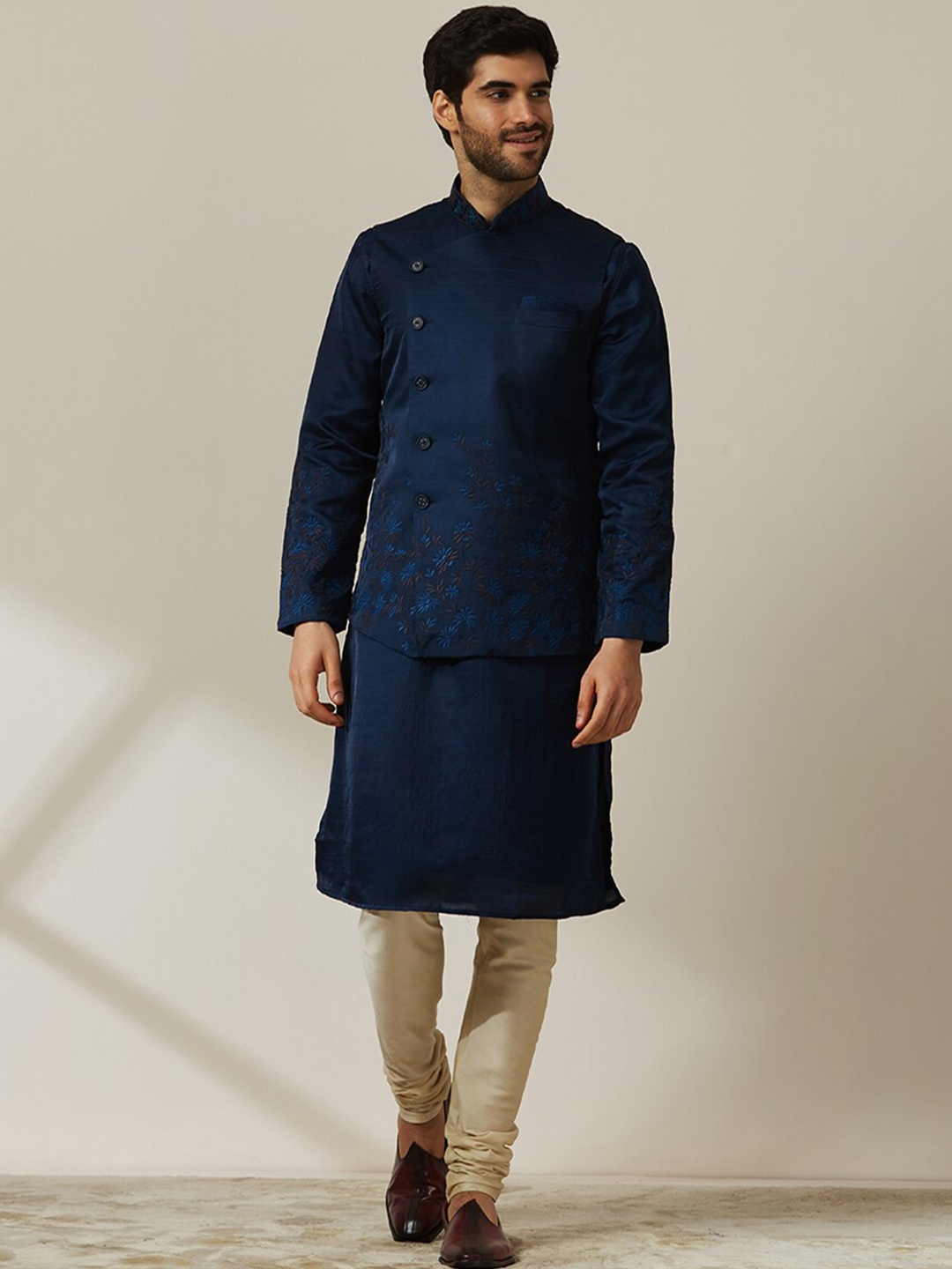 

Twamev Thread Work Mandarin Collar Straight Kurta & Churidar With Nehru Jacket, Navy blue