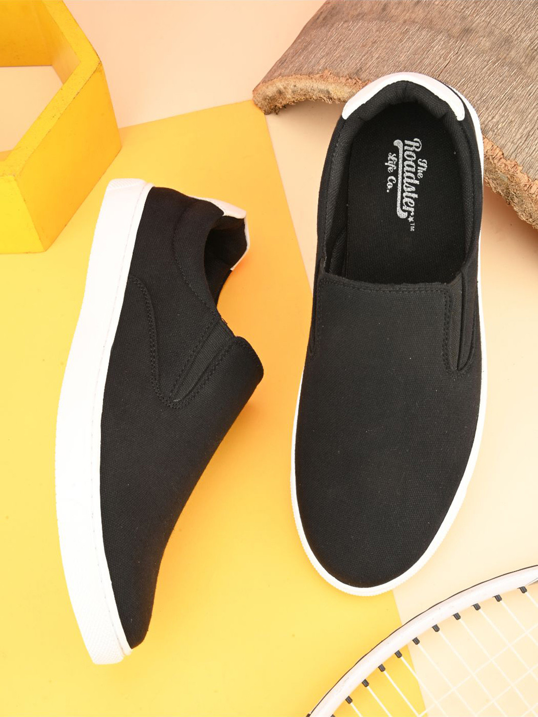

The Roadster Lifestyle Co. Men Black & White Canvas Lightweight Slip-On Sneakers