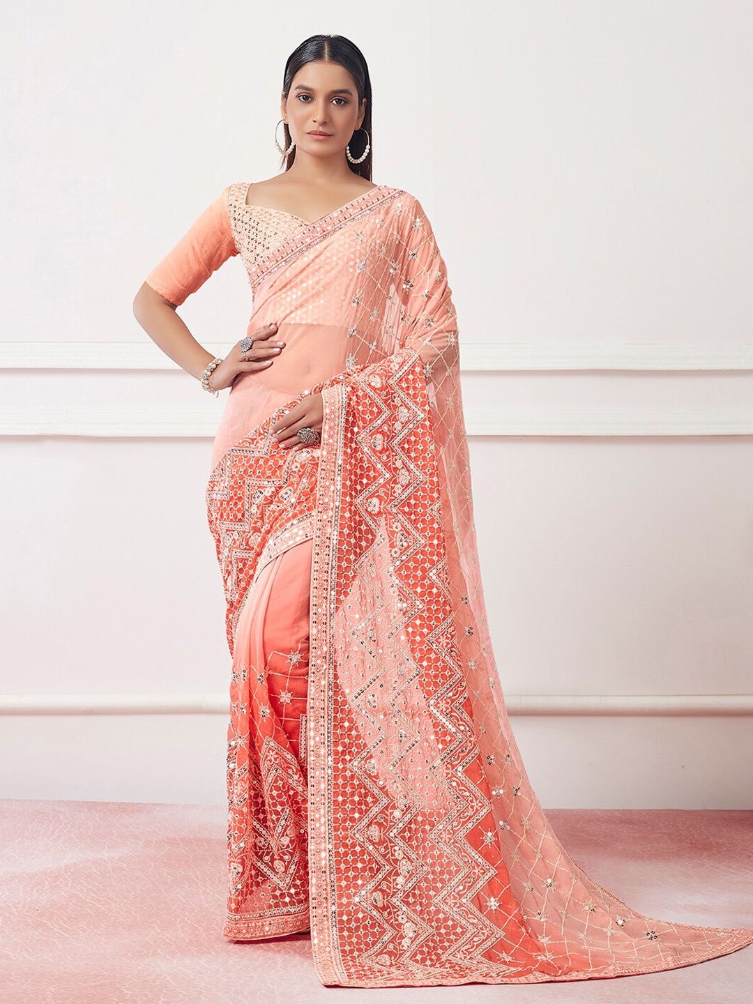 

Mitera Orange Embellished Sequinned Net Party Saree