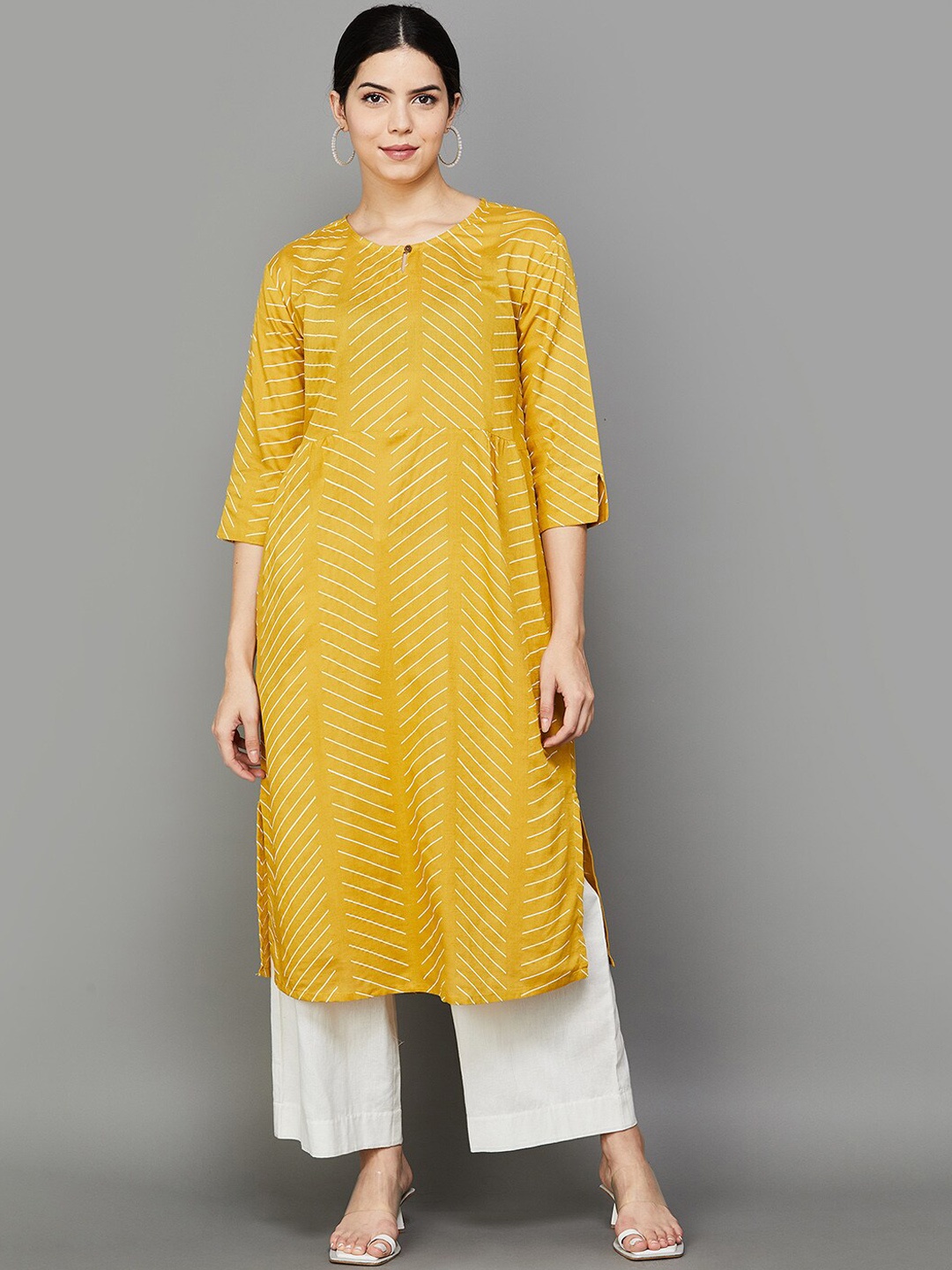 

Melange by Lifestyle Geometric Printed Keyhole Neck Straight Kurta, Mustard