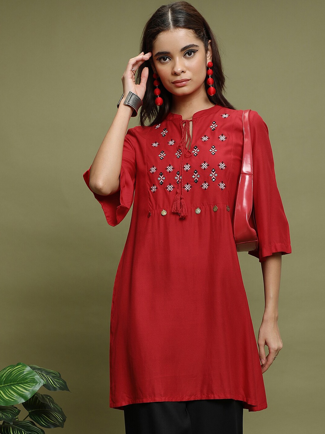 

Vishudh Geometric Printed Bell Sleeves Thread Work Kurti, Red