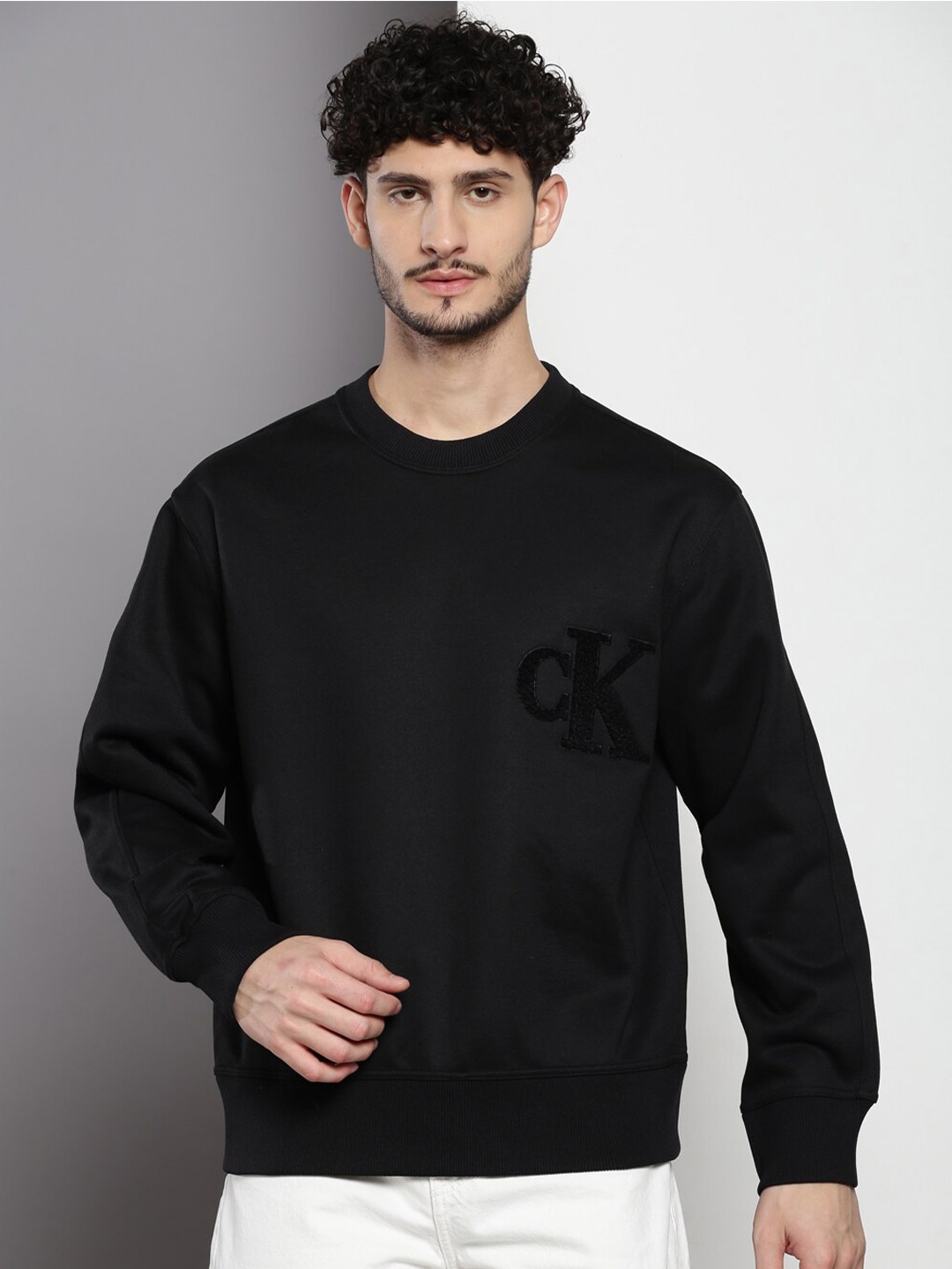 

Calvin Klein Jeans Brand Logo Printed Long Sleeve Pullover Sweatshirt, Black