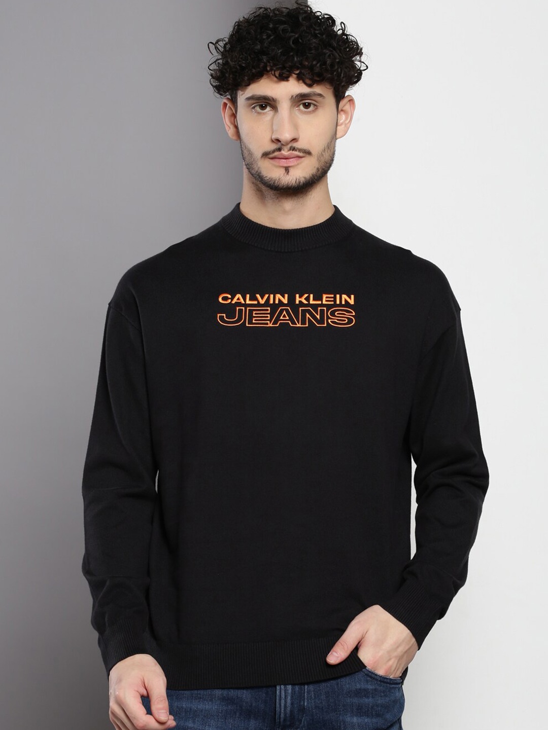 

Calvin Klein Jeans Typography Printed Round Neck Cotton Pullover Sweater, Black