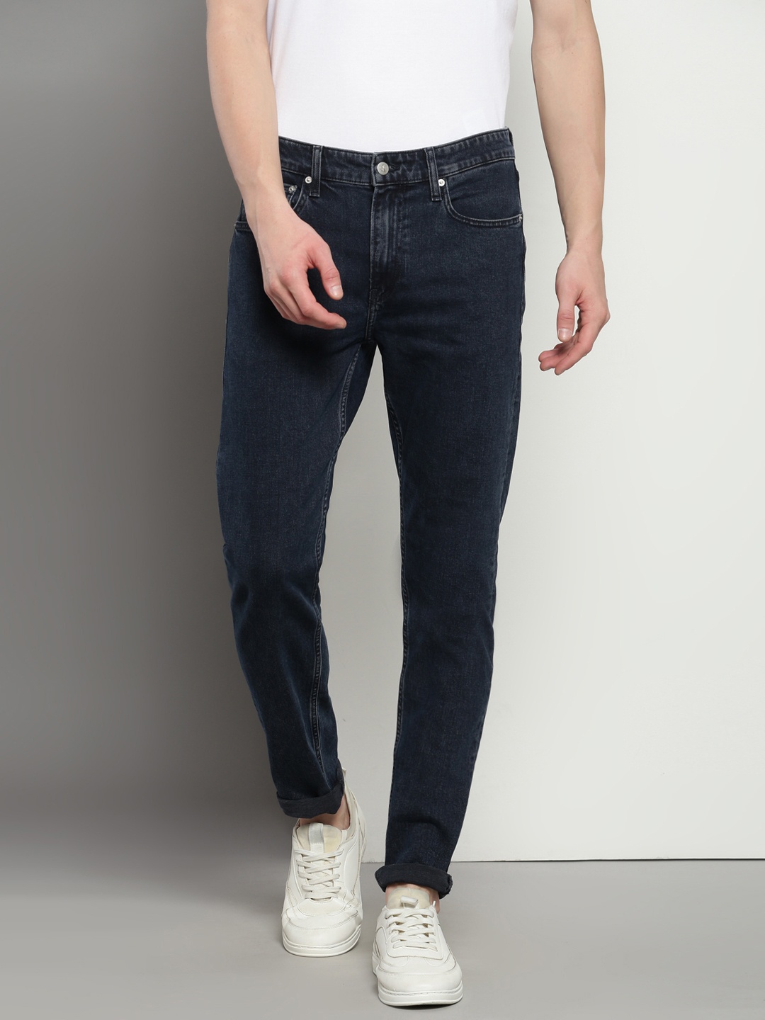 

Calvin Klein Jeans Men Slim Fit Clean Look Stretchable Cotton Jeans, Blue