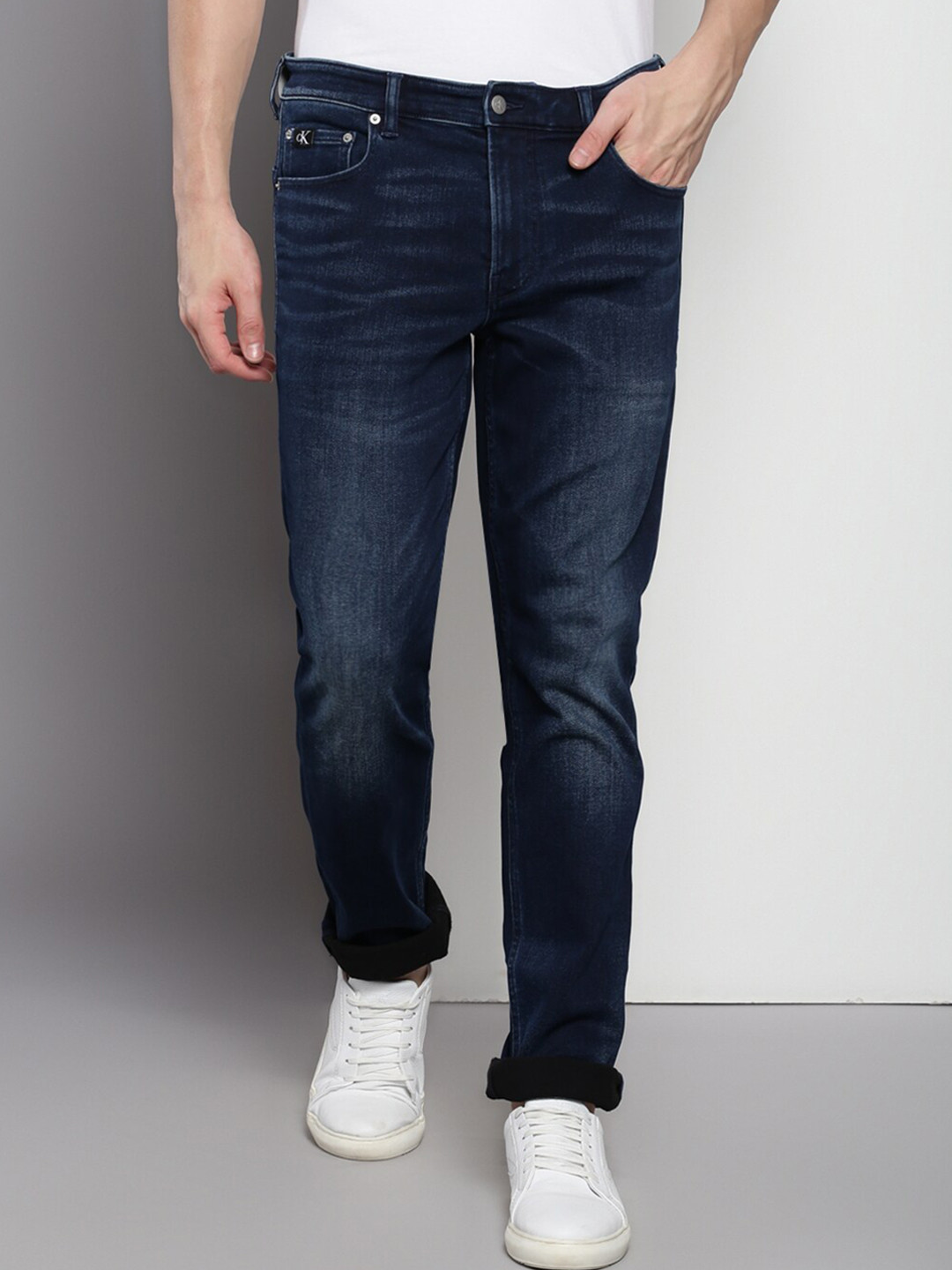 

Calvin Klein Men Body Clean Look Light Fade Stretchable Jeans, Blue