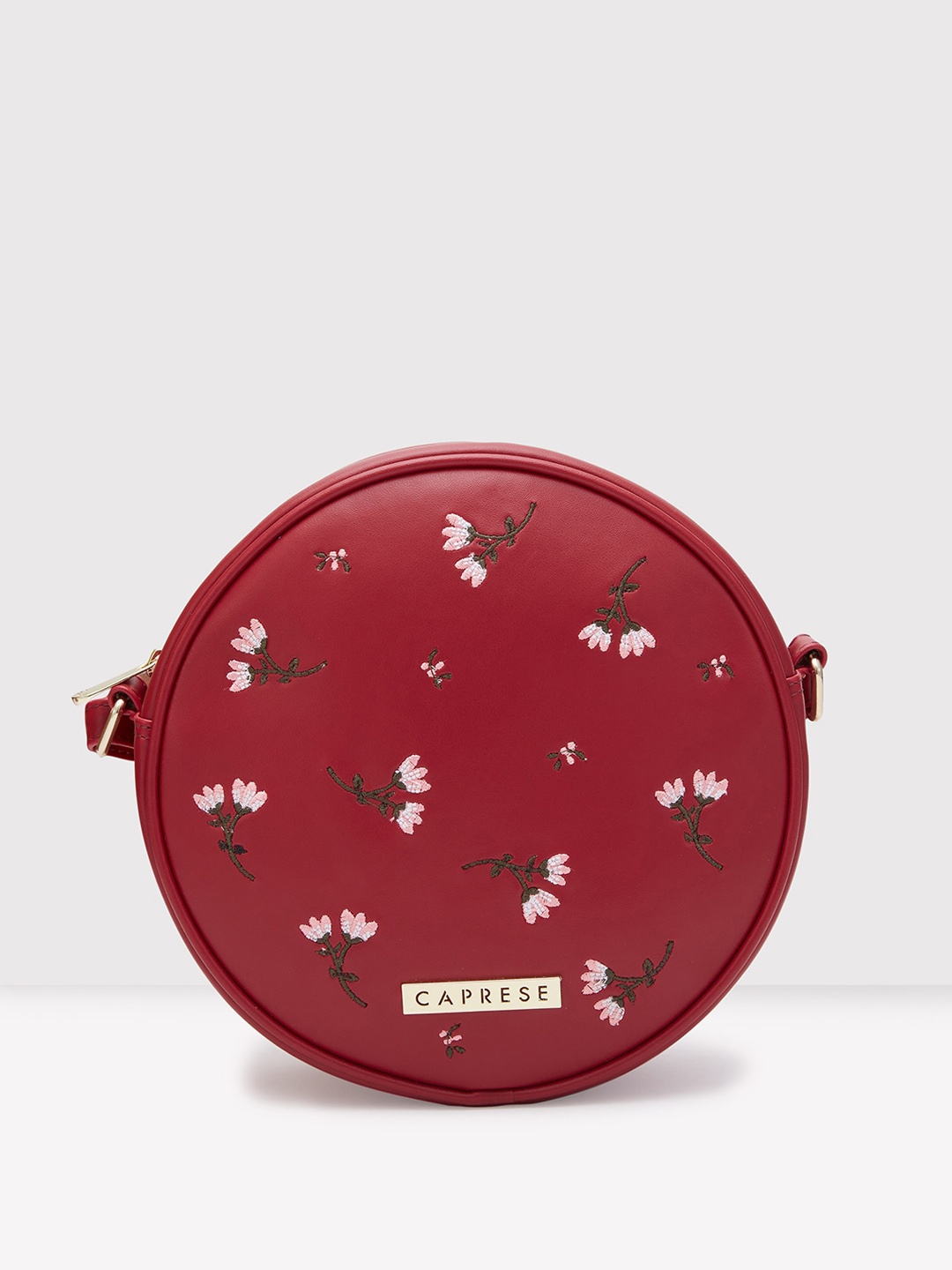 

Caprese Floral Embroidered Leather Half Moon Sling Bag, Maroon
