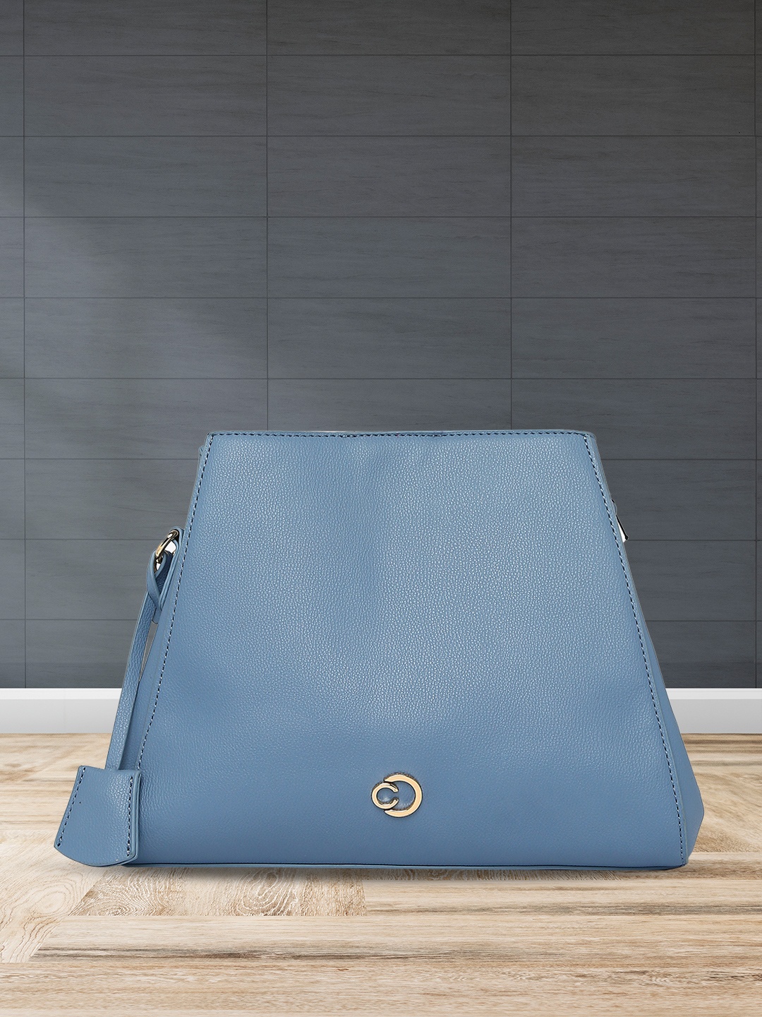 

Caprese Leather Swagger Sling Bag With Tasselled Detail, Blue