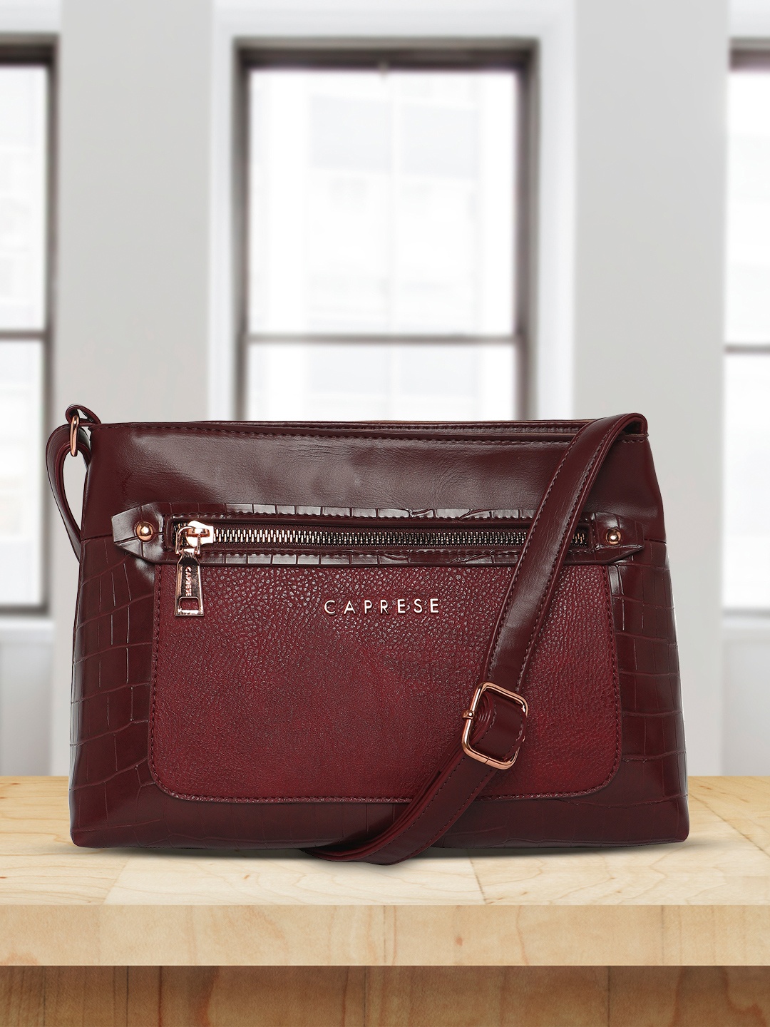 

Caprese Leather Structured Sling Bag, Burgundy